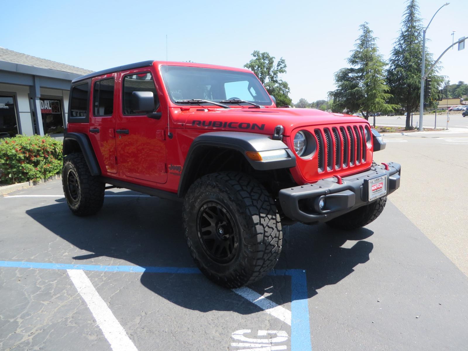 2020 Red /TAN Jeep Wrangler Unlimited Rubicon (1C4HJXFN8LW) with an 2.0L L4 DOHC 16V TURBO engine, 6A transmission, located at 2630 Grass Valley Highway, Auburn, CA, 95603, (530) 508-5100, 38.937893, -121.095482 - Featuring a brand new set of 17" Fuel Recoil wheels and 35" Toyo RT trail tires. - Photo #2