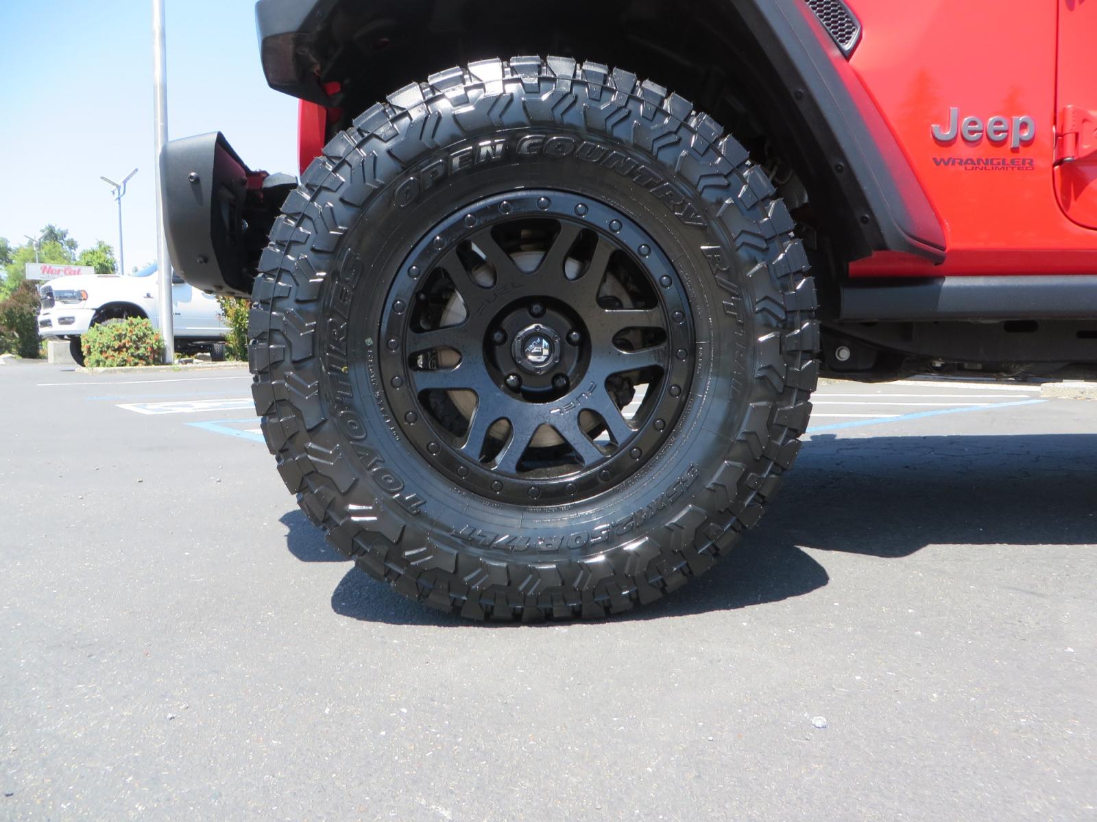 2020 Red /TAN Jeep Wrangler Unlimited Rubicon (1C4HJXFN8LW) with an 2.0L L4 DOHC 16V TURBO engine, 6A transmission, located at 2630 Grass Valley Highway, Auburn, CA, 95603, (530) 508-5100, 38.937893, -121.095482 - Featuring a brand new set of 17" Fuel Recoil wheels and 35" Toyo RT trail tires. - Photo #8