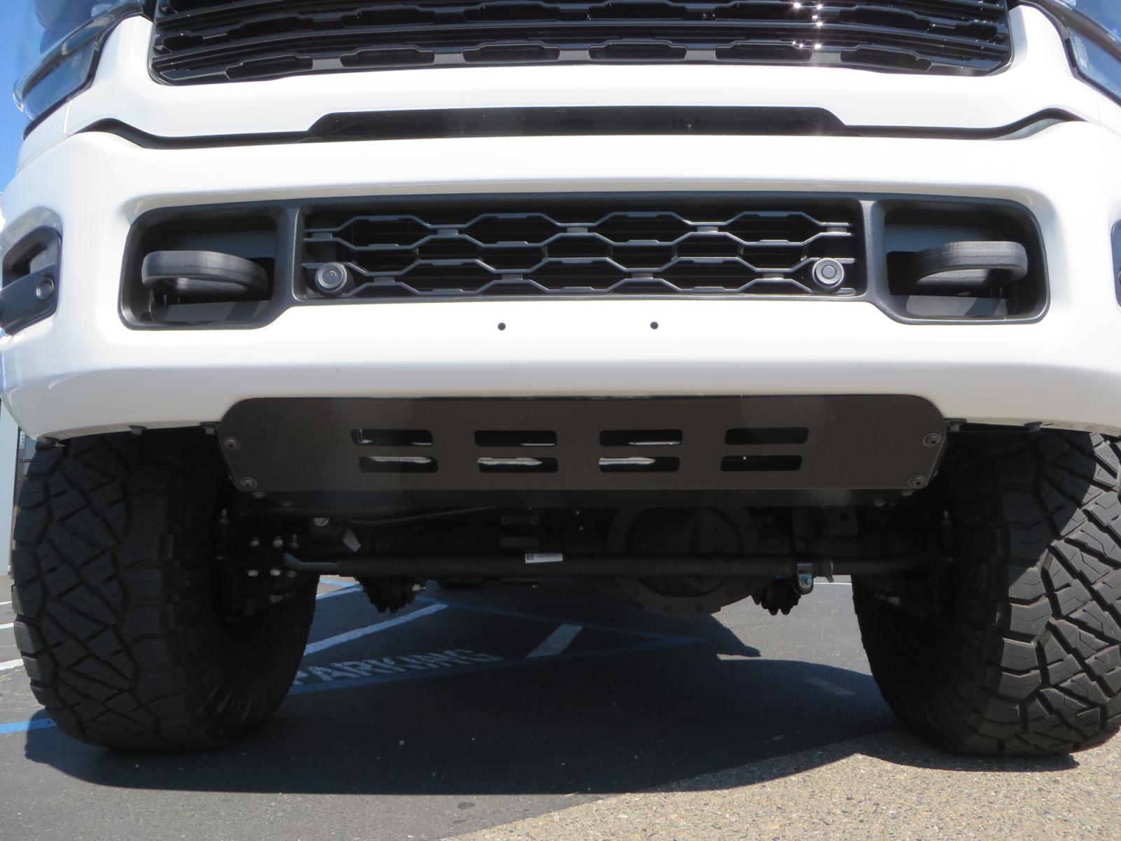2023 White /BLACK RAM 3500 Limited Mega Cab 4WD (3C63R3PL6PG) with an 6.7L L6 OHV 24V TURBO DIESEL engine, 6A transmission, located at 2630 Grass Valley Highway, Auburn, CA, 95603, (530) 508-5100, 38.937893, -121.095482 - Limited Ram 3500 just built with a BDS 4" long arm suspension system, Fox 2.5 Performance Elite series shocks, Fox ATS steering stabilizer, Carli Suspension rear leaf spring Add- A-Packs, 37" Nitto Ridge Grappler tires, 18" Method NV wheels, CJC Offroad Intercooler guard, B&W tow and stow hitch, Bol - Photo #13