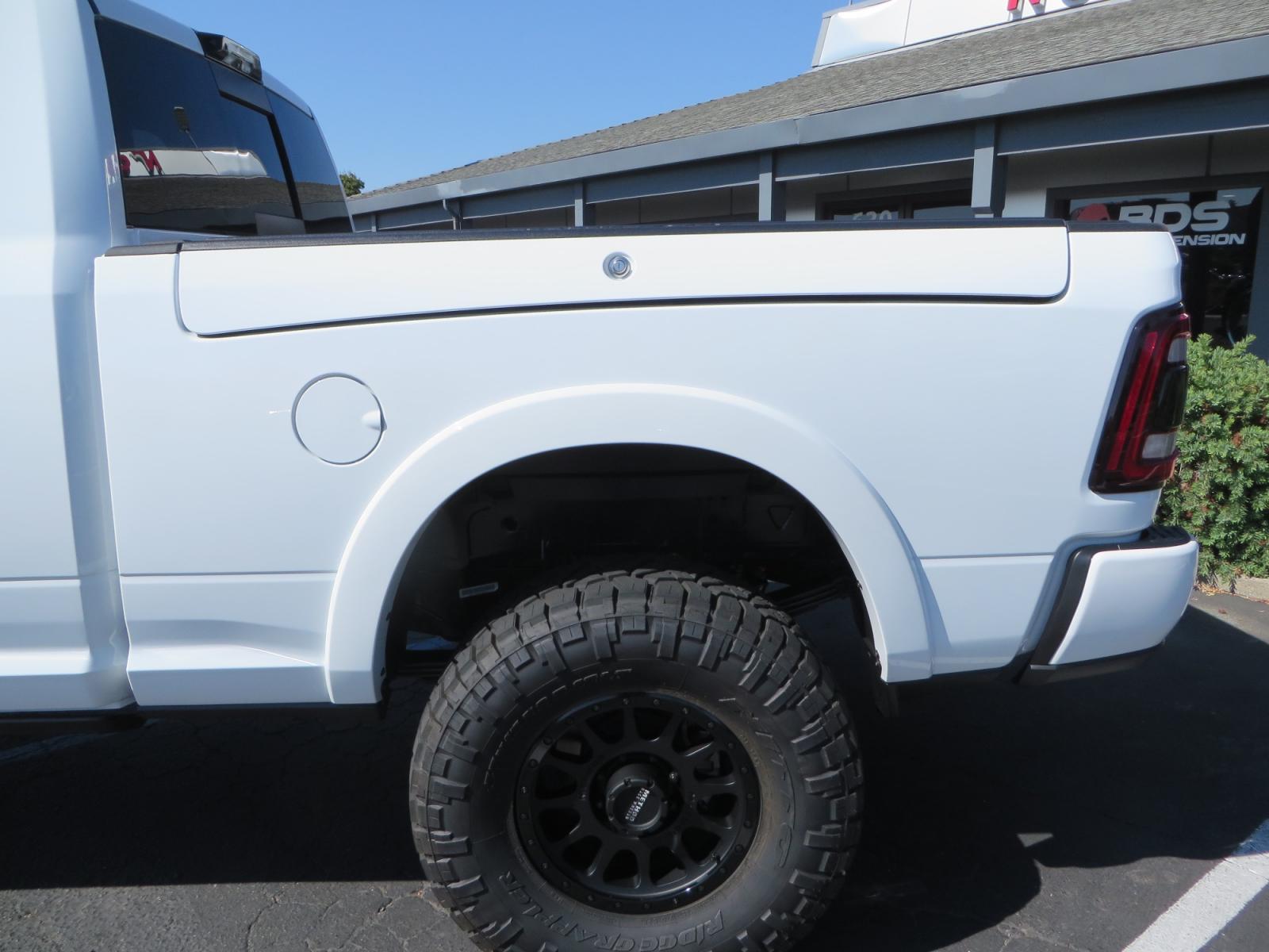 2023 White /BLACK RAM 3500 Limited Mega Cab 4WD (3C63R3PL6PG) with an 6.7L L6 OHV 24V TURBO DIESEL engine, 6A transmission, located at 2630 Grass Valley Highway, Auburn, CA, 95603, (530) 508-5100, 38.937893, -121.095482 - Limited Ram 3500 just built with a BDS 4" long arm suspension system, Fox 2.5 Performance Elite series shocks, Fox ATS steering stabilizer, Carli Suspension rear leaf spring Add- A-Packs, 37" Nitto Ridge Grappler tires, 18" Method NV wheels, CJC Offroad Intercooler guard, B&W tow and stow hitch, Bol - Photo #17