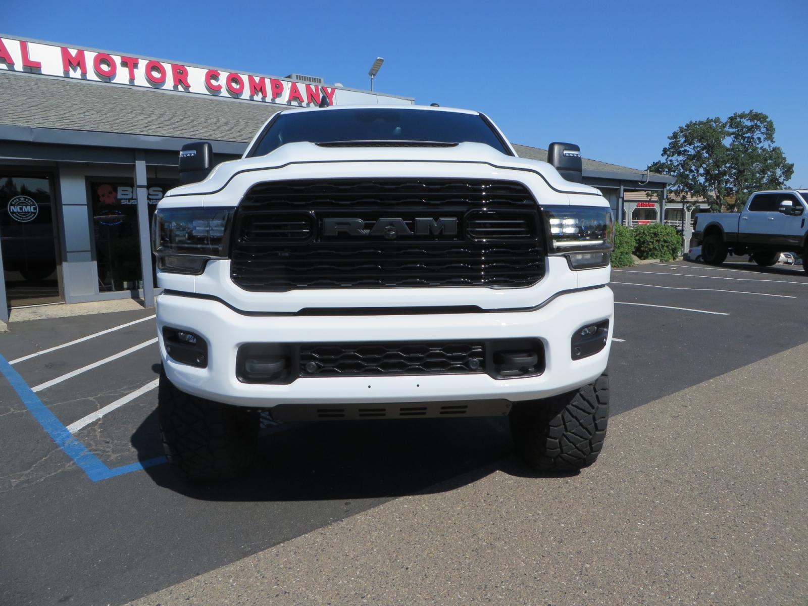 2023 White /BLACK RAM 3500 Limited Mega Cab 4WD (3C63R3PL6PG) with an 6.7L L6 OHV 24V TURBO DIESEL engine, 6A transmission, located at 2630 Grass Valley Highway, Auburn, CA, 95603, (530) 508-5100, 38.937893, -121.095482 - Limited Ram 3500 just built with a BDS 4" long arm suspension system, Fox 2.5 Performance Elite series shocks, Fox ATS steering stabilizer, Carli Suspension rear leaf spring Add- A-Packs, 37" Nitto Ridge Grappler tires, 18" Method NV wheels, CJC Offroad Intercooler guard, B&W tow and stow hitch, Bol - Photo #1