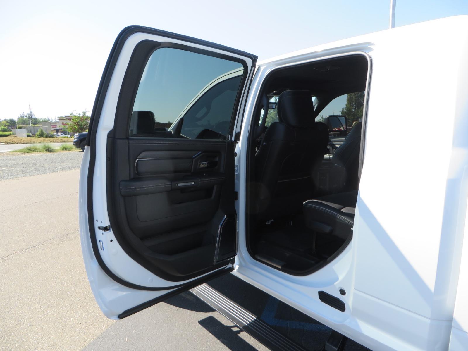 2023 White /BLACK RAM 3500 Limited Mega Cab 4WD (3C63R3PL6PG) with an 6.7L L6 OHV 24V TURBO DIESEL engine, 6A transmission, located at 2630 Grass Valley Highway, Auburn, CA, 95603, (530) 508-5100, 38.937893, -121.095482 - Limited Ram 3500 just built with a BDS 4" long arm suspension system, Fox 2.5 Performance Elite series shocks, Fox ATS steering stabilizer, Carli Suspension rear leaf spring Add- A-Packs, 37" Nitto Ridge Grappler tires, 18" Method NV wheels, CJC Offroad Intercooler guard, B&W tow and stow hitch, Bol - Photo #45