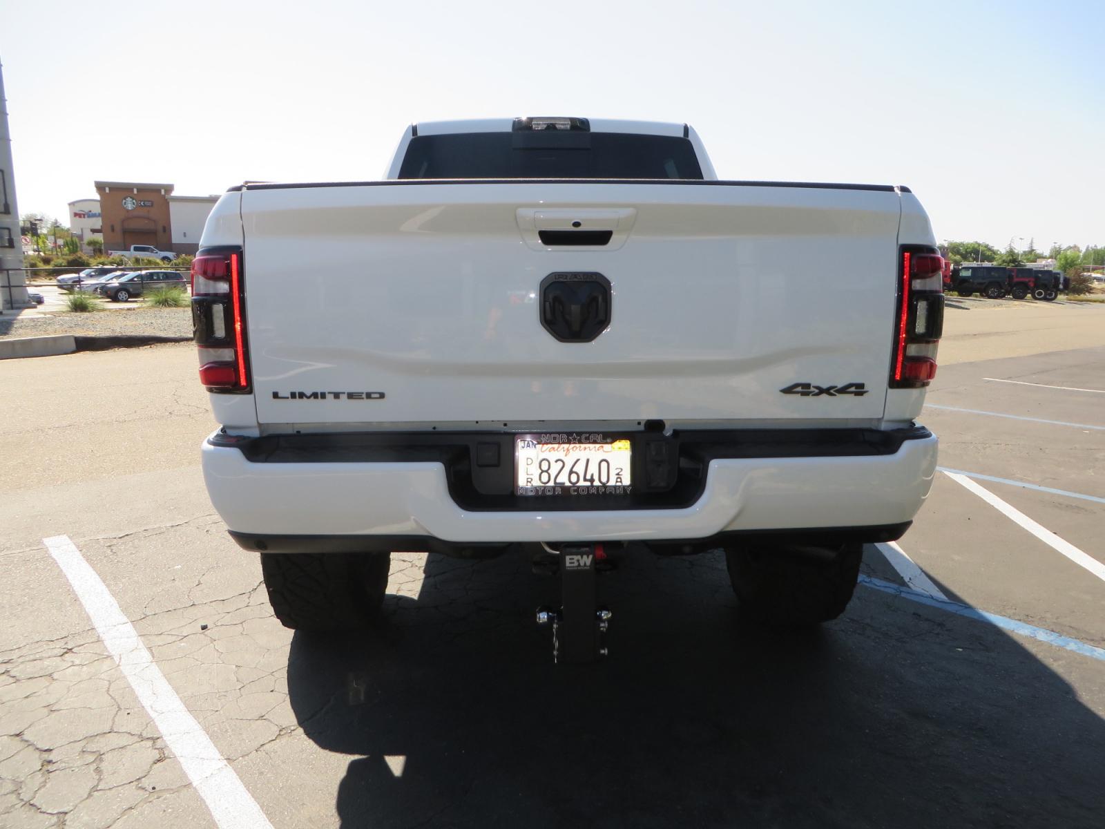 2023 White /BLACK RAM 3500 Limited Mega Cab 4WD (3C63R3PL6PG) with an 6.7L L6 OHV 24V TURBO DIESEL engine, 6A transmission, located at 2630 Grass Valley Highway, Auburn, CA, 95603, (530) 508-5100, 38.937893, -121.095482 - Limited Ram 3500 just built with a BDS 4" long arm suspension system, Fox 2.5 Performance Elite series shocks, Fox ATS steering stabilizer, Carli Suspension rear leaf spring Add- A-Packs, 37" Nitto Ridge Grappler tires, 18" Method NV wheels, CJC Offroad Intercooler guard, B&W tow and stow hitch, Bol - Photo #5