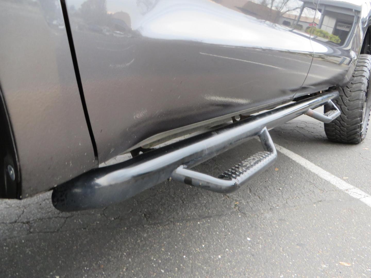 2014 Charcoal Toyota Tundra CrewMax SR5 5.7L V8 CrewMax 4WD (5TFDY5F14EX) with an V8 5.7 Liter engine, Automatic 6-Spd w/Sequential Mode transmission, located at 2630 Grass Valley Highway, Auburn, CA, 95603, (530) 508-5100, 38.937893, -121.095482 - BDS 7" lift kit, Fox remote reservoir coilovers, Fox 2.0 rear shocks, 37" Toyo MT tires, 20" Gear Alloy Big Block wheels, N-Fab running boards, Air Bags, Amp Bed extender, Weathertech floor liners, and window tint. - Photo#11