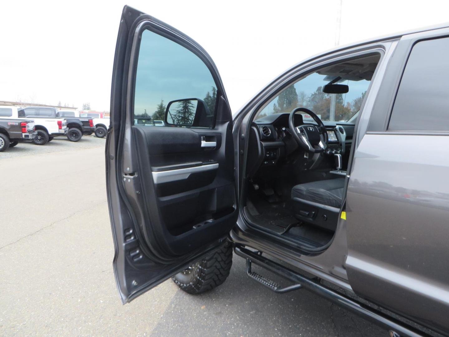 2014 Charcoal Toyota Tundra CrewMax SR5 5.7L V8 CrewMax 4WD (5TFDY5F14EX) with an V8 5.7 Liter engine, Automatic 6-Spd w/Sequential Mode transmission, located at 2630 Grass Valley Highway, Auburn, CA, 95603, (530) 508-5100, 38.937893, -121.095482 - BDS 7" lift kit, Fox remote reservoir coilovers, Fox 2.0 rear shocks, 37" Toyo MT tires, 20" Gear Alloy Big Block wheels, N-Fab running boards, Air Bags, Amp Bed extender, Weathertech floor liners, and window tint. - Photo#18