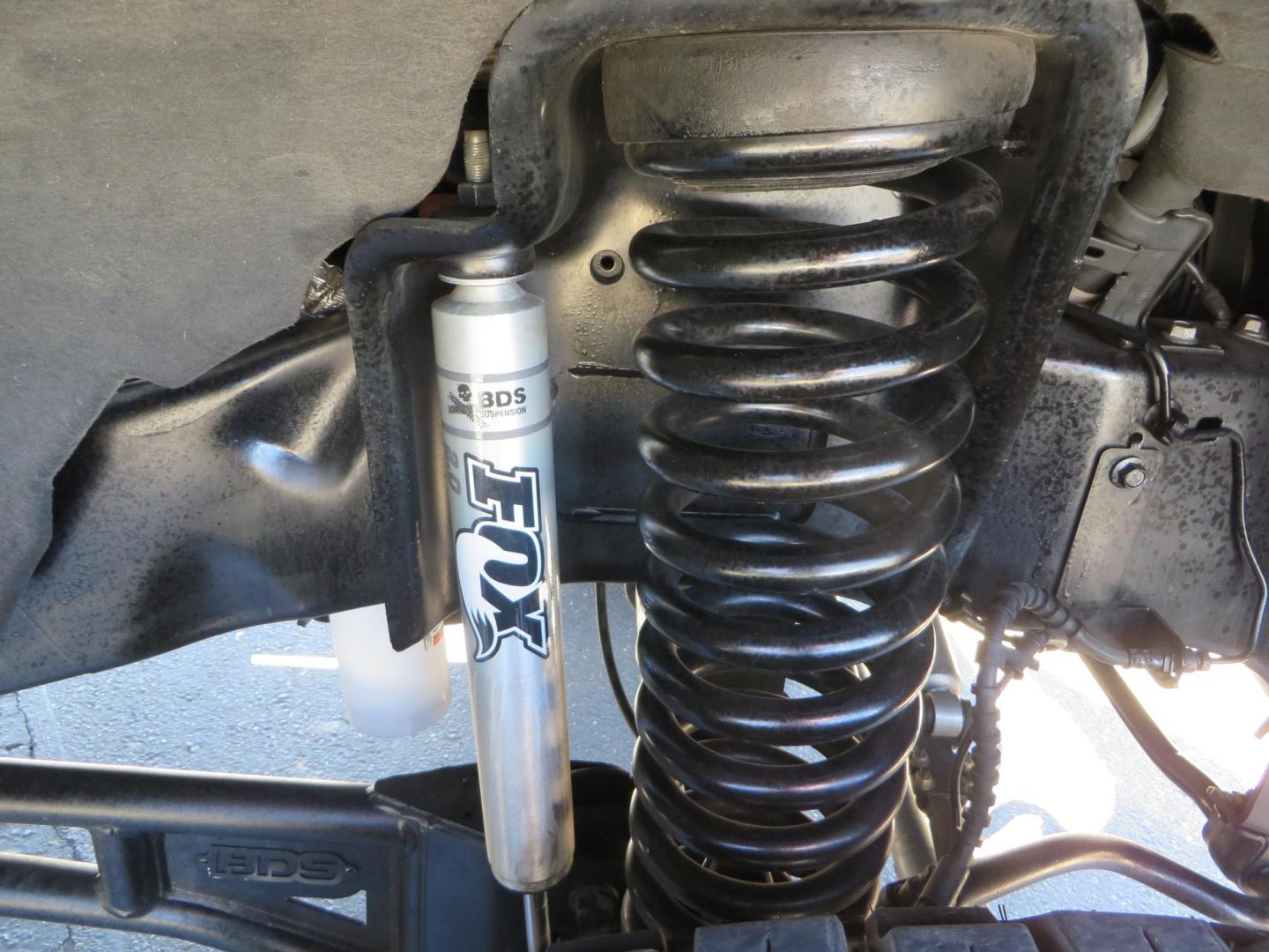 2019 Charcoal /BLACK Ford F250 Super Duty Crew Cab Lariat Crew Cab 4WD (1FT7W2BT0KE) with an V8 Turbo Diesel 6.7 Liter engine, Automatic 6-Spd w/SelectShift and TorqShift-G transmission, located at 2630 Grass Valley Highway, Auburn, CA, 95603, (530) 508-5100, 38.937893, -121.095482 - Features - BDS 4" radius arm suspension system, Fox 2.0 shocks, 37" NItto Ridge Grappler tires, 20" Method NV wheels, and window tint. - Photo#12