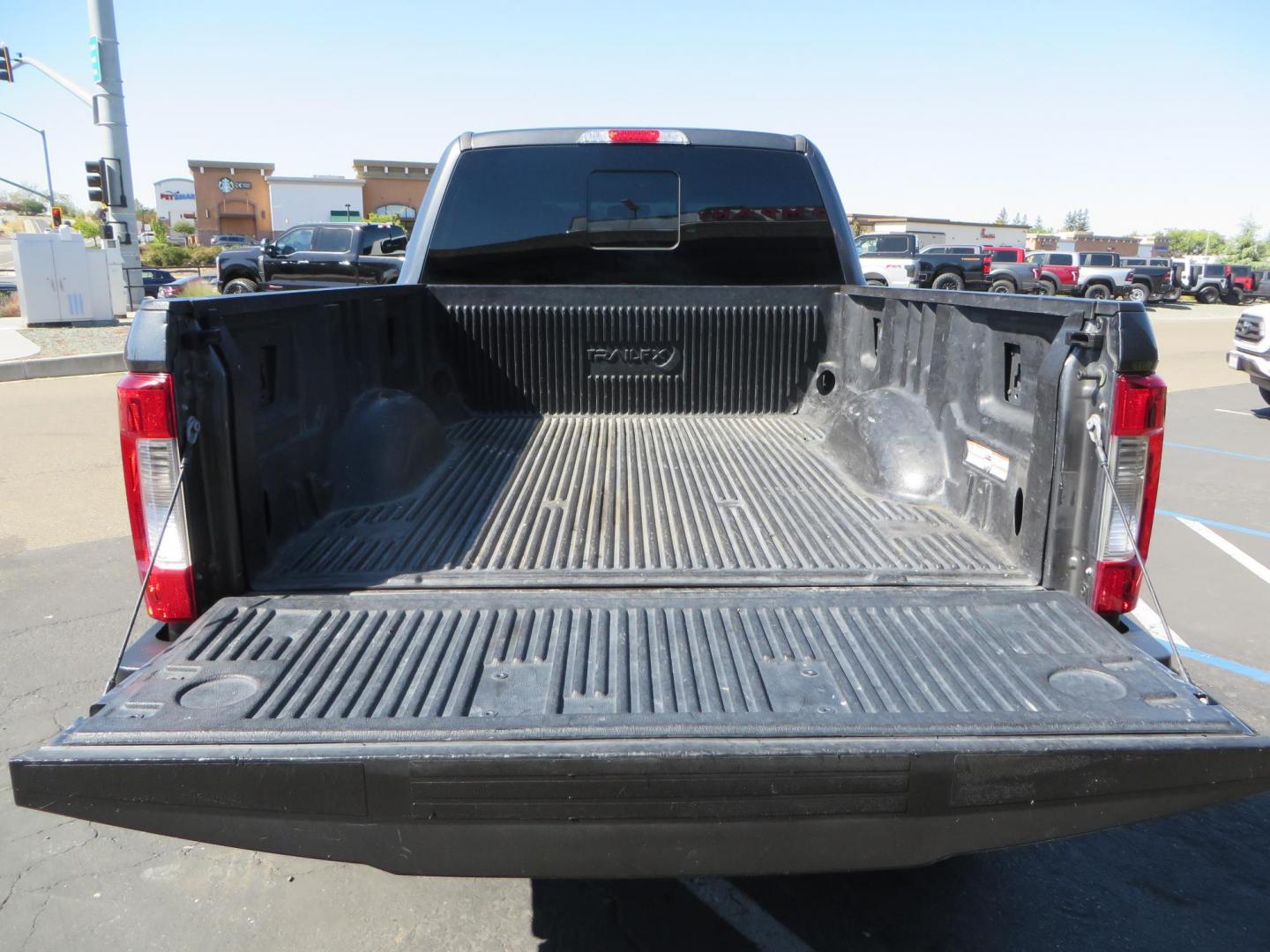 2019 Charcoal /BLACK Ford F250 Super Duty Crew Cab Lariat Crew Cab 4WD (1FT7W2BT0KE) with an V8 Turbo Diesel 6.7 Liter engine, Automatic 6-Spd w/SelectShift and TorqShift-G transmission, located at 2630 Grass Valley Highway, Auburn, CA, 95603, (530) 508-5100, 38.937893, -121.095482 - Features - BDS 4" radius arm suspension system, Fox 2.0 shocks, 37" NItto Ridge Grappler tires, 20" Method NV wheels, and window tint. - Photo#15