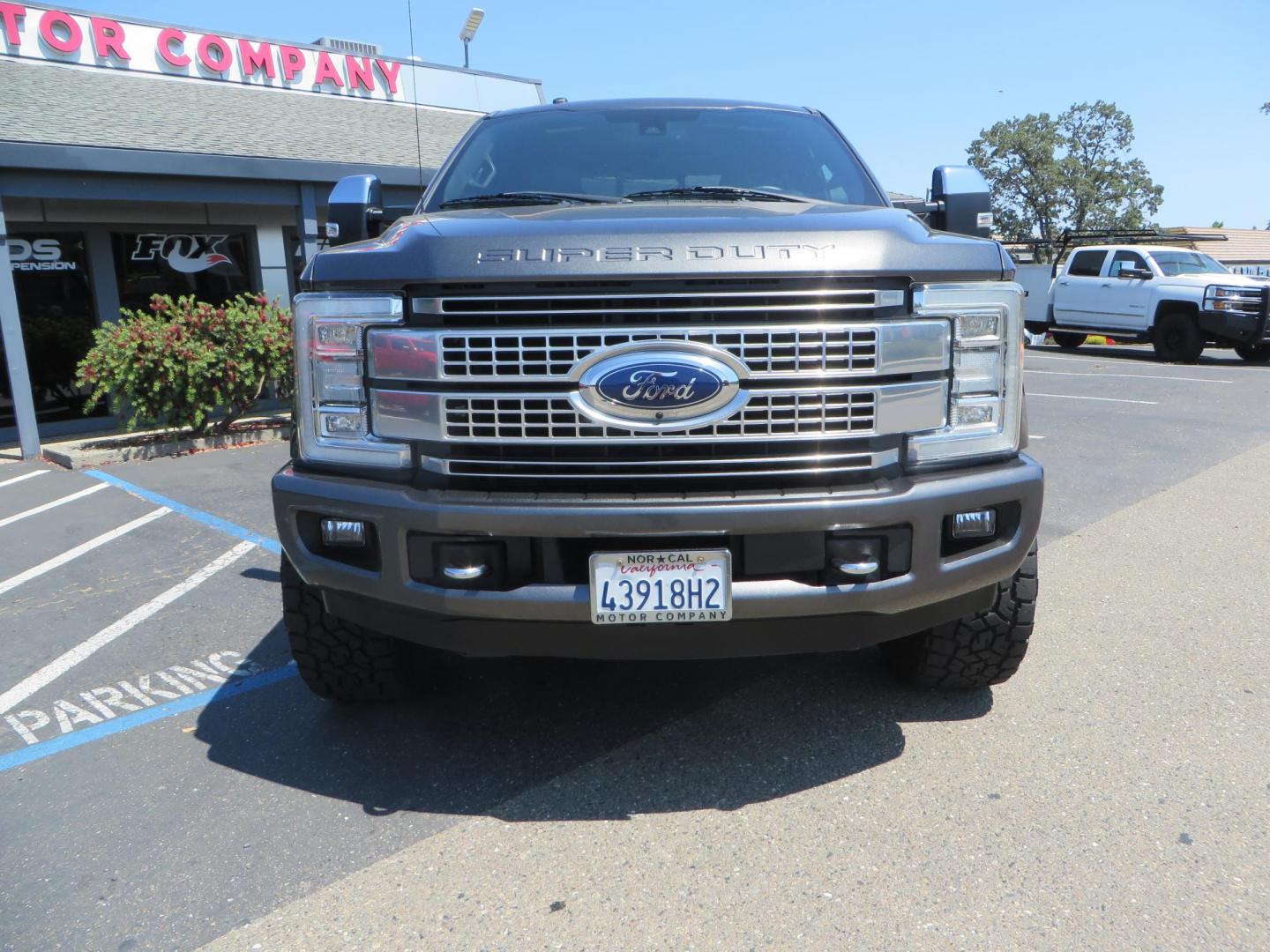 2017 Charcoal Ford F350 Super Duty Crew Cab Platinum Crew Cab Long Bed 4WD (1FT8W3BT5HE) with an V8 Turbo Diesel 6.7L engine, Auto HD 6-Spd SelShft transmission, located at 2630 Grass Valley Highway, Auburn, CA, 95603, (530) 508-5100, 38.937893, -121.095482 - Leveled Long Bed Platinum Superduty sitting on 20" Asanti wheels and Toyo AT3 tires. - Photo#1
