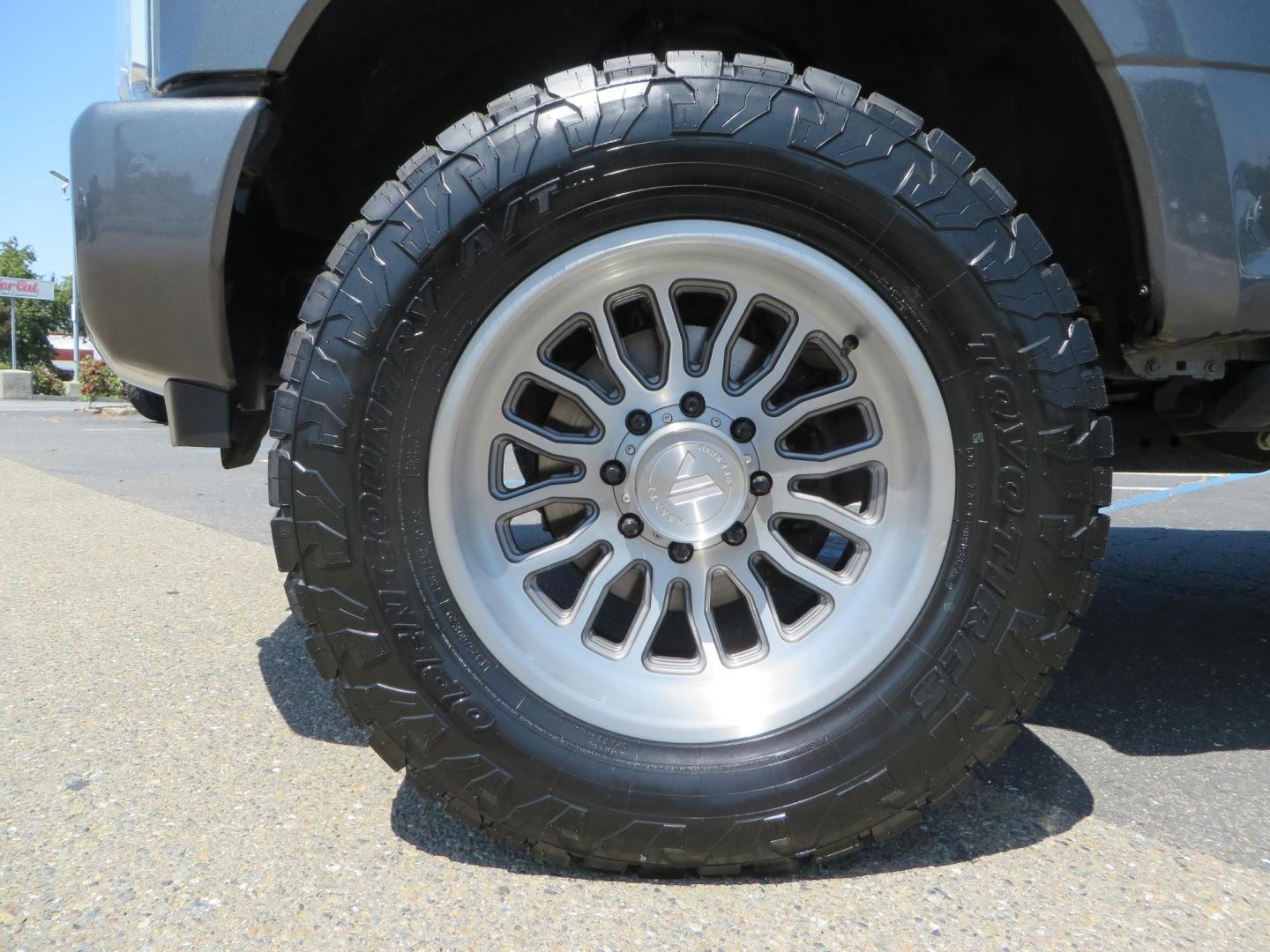 2017 Charcoal Ford F350 Super Duty Crew Cab Platinum Crew Cab Long Bed 4WD (1FT8W3BT5HE) with an V8 Turbo Diesel 6.7L engine, Auto HD 6-Spd SelShft transmission, located at 2630 Grass Valley Highway, Auburn, CA, 95603, (530) 508-5100, 38.937893, -121.095482 - Leveled Long Bed Platinum Superduty sitting on 20" Asanti wheels and Toyo AT3 tires. - Photo#8