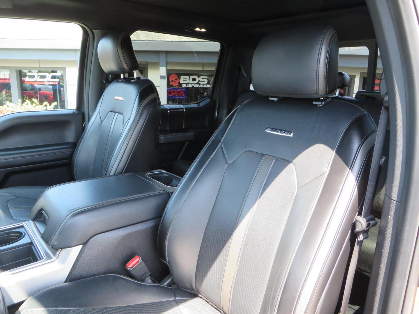 2017 Charcoal Ford F350 Super Duty Crew Cab Platinum Crew Cab Long Bed 4WD (1FT8W3BT5HE) with an V8 Turbo Diesel 6.7L engine, Auto HD 6-Spd SelShft transmission, located at 2630 Grass Valley Highway, Auburn, CA, 95603, (530) 508-5100, 38.937893, -121.095482 - Leveled Long Bed Platinum Superduty sitting on 20" Asanti wheels and Toyo AT3 tires. - Photo#22