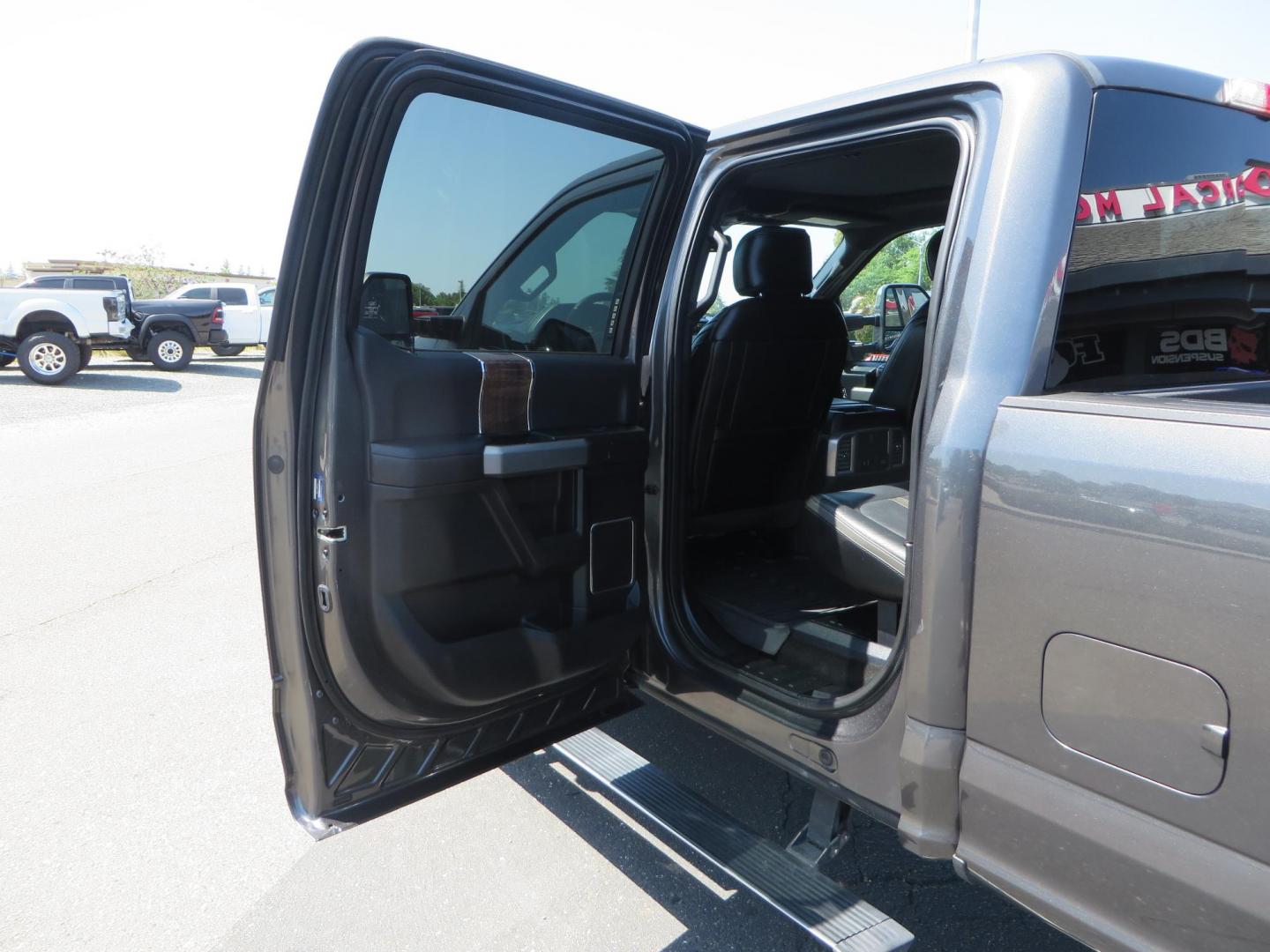 2017 Charcoal Ford F350 Super Duty Crew Cab Platinum Crew Cab Long Bed 4WD (1FT8W3BT5HE) with an V8 Turbo Diesel 6.7L engine, Auto HD 6-Spd SelShft transmission, located at 2630 Grass Valley Highway, Auburn, CA, 95603, (530) 508-5100, 38.937893, -121.095482 - Leveled Long Bed Platinum Superduty sitting on 20" Asanti wheels and Toyo AT3 tires. - Photo#44