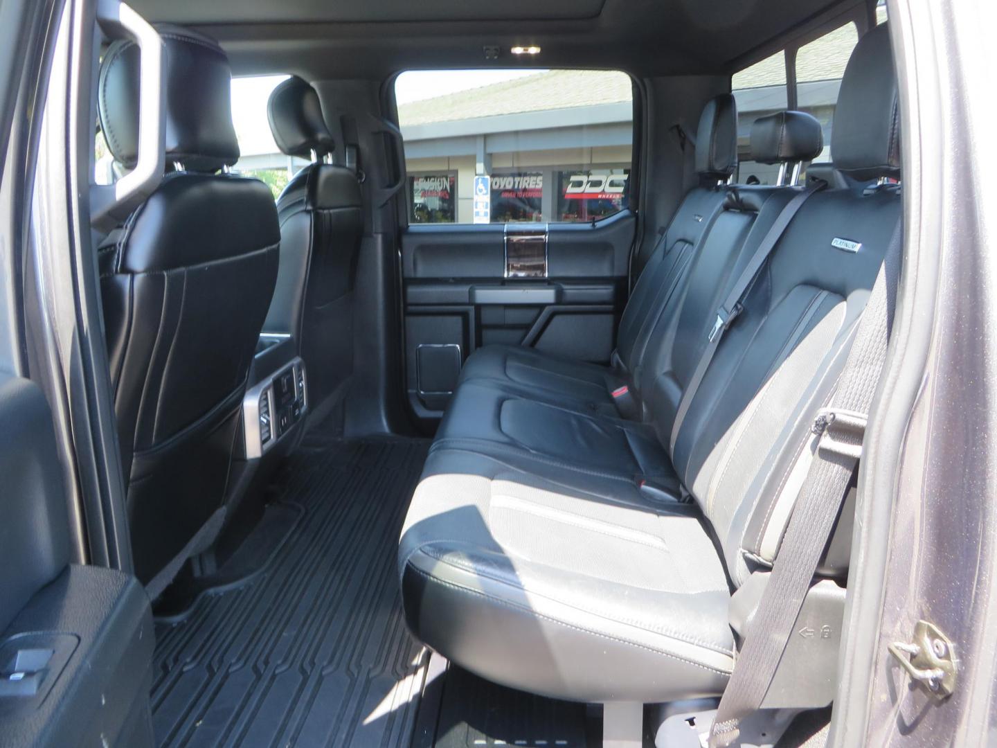 2017 Charcoal Ford F350 Super Duty Crew Cab Platinum Crew Cab Long Bed 4WD (1FT8W3BT5HE) with an V8 Turbo Diesel 6.7L engine, Auto HD 6-Spd SelShft transmission, located at 2630 Grass Valley Highway, Auburn, CA, 95603, (530) 508-5100, 38.937893, -121.095482 - Leveled Long Bed Platinum Superduty sitting on 20" Asanti wheels and Toyo AT3 tires. - Photo#46