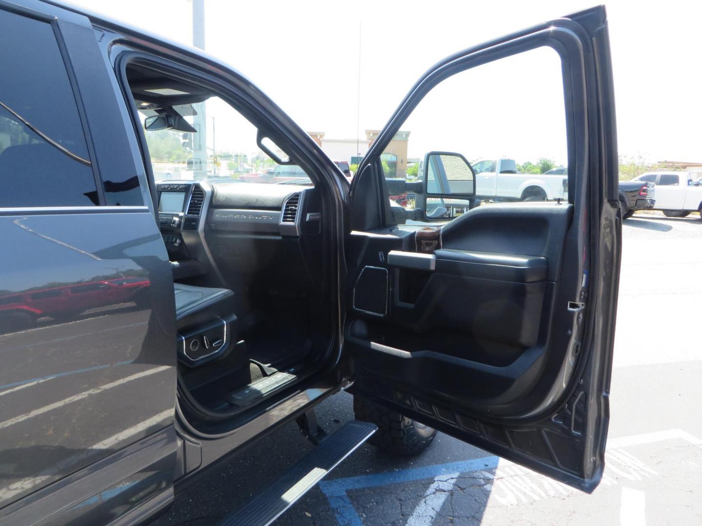 2017 Charcoal Ford F350 Super Duty Crew Cab Platinum Crew Cab Long Bed 4WD (1FT8W3BT5HE) with an V8 Turbo Diesel 6.7L engine, Auto HD 6-Spd SelShft transmission, located at 2630 Grass Valley Highway, Auburn, CA, 95603, (530) 508-5100, 38.937893, -121.095482 - Leveled Long Bed Platinum Superduty sitting on 20" Asanti wheels and Toyo AT3 tires. - Photo#51