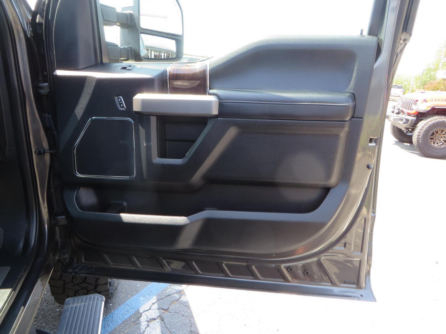 2017 Charcoal Ford F350 Super Duty Crew Cab Platinum Crew Cab Long Bed 4WD (1FT8W3BT5HE) with an V8 Turbo Diesel 6.7L engine, Auto HD 6-Spd SelShft transmission, located at 2630 Grass Valley Highway, Auburn, CA, 95603, (530) 508-5100, 38.937893, -121.095482 - Leveled Long Bed Platinum Superduty sitting on 20" Asanti wheels and Toyo AT3 tires. - Photo#52