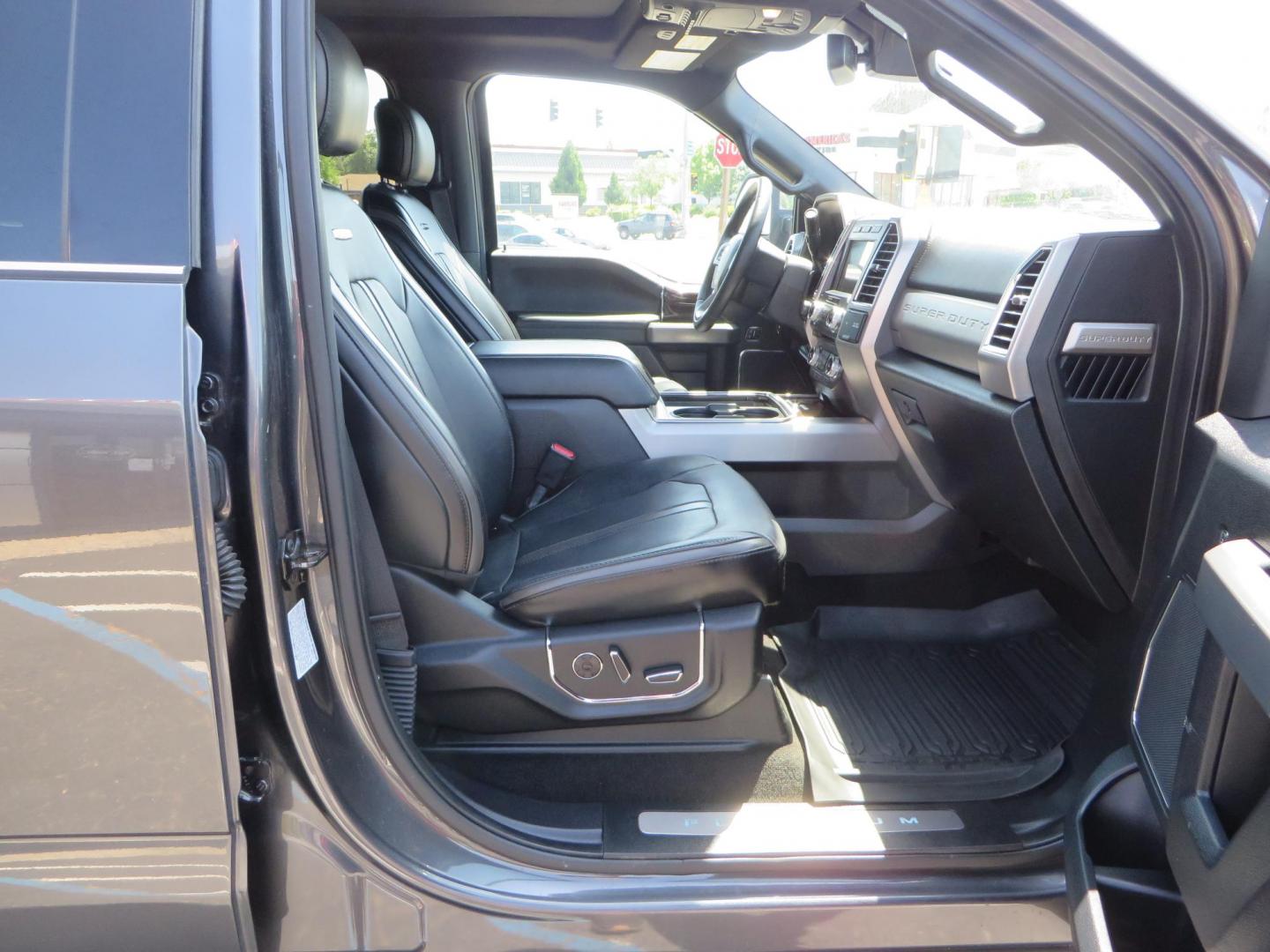 2017 Charcoal Ford F350 Super Duty Crew Cab Platinum Crew Cab Long Bed 4WD (1FT8W3BT5HE) with an V8 Turbo Diesel 6.7L engine, Auto HD 6-Spd SelShft transmission, located at 2630 Grass Valley Highway, Auburn, CA, 95603, (530) 508-5100, 38.937893, -121.095482 - Leveled Long Bed Platinum Superduty sitting on 20" Asanti wheels and Toyo AT3 tires. - Photo#54
