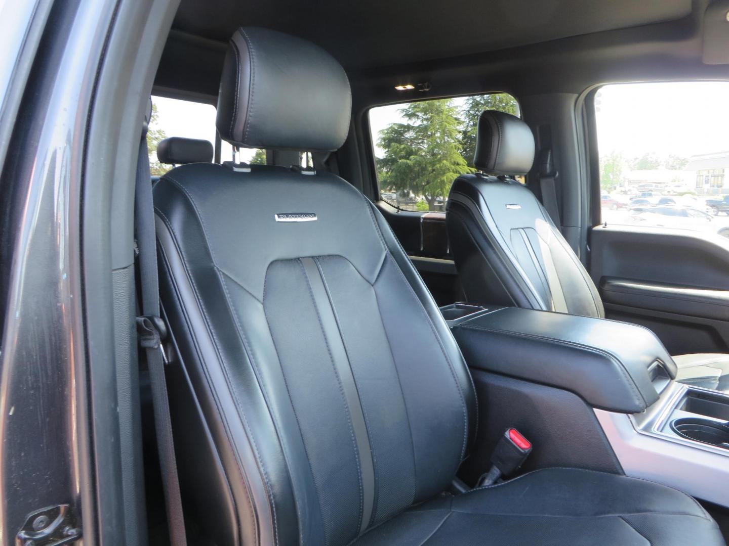 2017 Charcoal Ford F350 Super Duty Crew Cab Platinum Crew Cab Long Bed 4WD (1FT8W3BT5HE) with an V8 Turbo Diesel 6.7L engine, Auto HD 6-Spd SelShft transmission, located at 2630 Grass Valley Highway, Auburn, CA, 95603, (530) 508-5100, 38.937893, -121.095482 - Leveled Long Bed Platinum Superduty sitting on 20" Asanti wheels and Toyo AT3 tires. - Photo#55