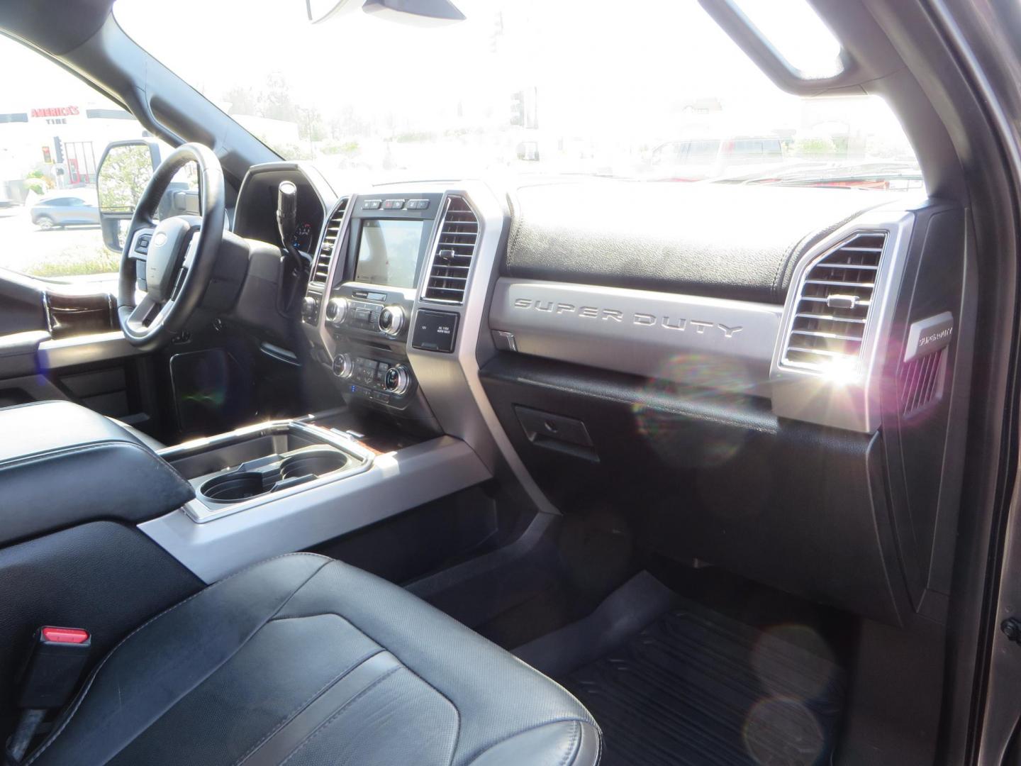 2017 Charcoal Ford F350 Super Duty Crew Cab Platinum Crew Cab Long Bed 4WD (1FT8W3BT5HE) with an V8 Turbo Diesel 6.7L engine, Auto HD 6-Spd SelShft transmission, located at 2630 Grass Valley Highway, Auburn, CA, 95603, (530) 508-5100, 38.937893, -121.095482 - Leveled Long Bed Platinum Superduty sitting on 20" Asanti wheels and Toyo AT3 tires. - Photo#57