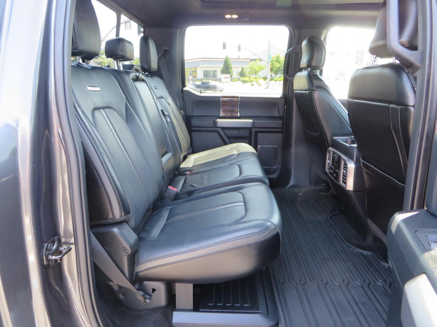 2017 Charcoal Ford F350 Super Duty Crew Cab Platinum Crew Cab Long Bed 4WD (1FT8W3BT5HE) with an V8 Turbo Diesel 6.7L engine, Auto HD 6-Spd SelShft transmission, located at 2630 Grass Valley Highway, Auburn, CA, 95603, (530) 508-5100, 38.937893, -121.095482 - Leveled Long Bed Platinum Superduty sitting on 20" Asanti wheels and Toyo AT3 tires. - Photo#61