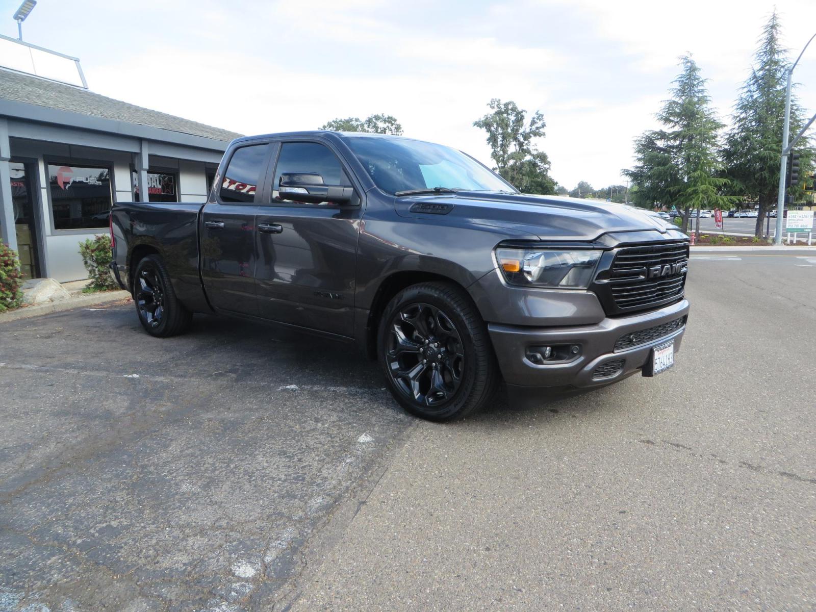 2021 GRANITE CRYSTAL Ram 1500 Quad Cab Big Horn Pickup 4D 6 1/3 ft (1C6RREBT8MN) with an V8 HEMI eTorque 5.7 Liter engine, Automatic 8-Spd transmission, located at 2630 Grass Valley Highway, Auburn, CA, 95603, (530) 508-5100, 38.937893, -121.095482 - Maxtrac 3/1 lowering kit sitting on top of factory 22" wheels and tires and a Magnaflow muffler. - Photo #2