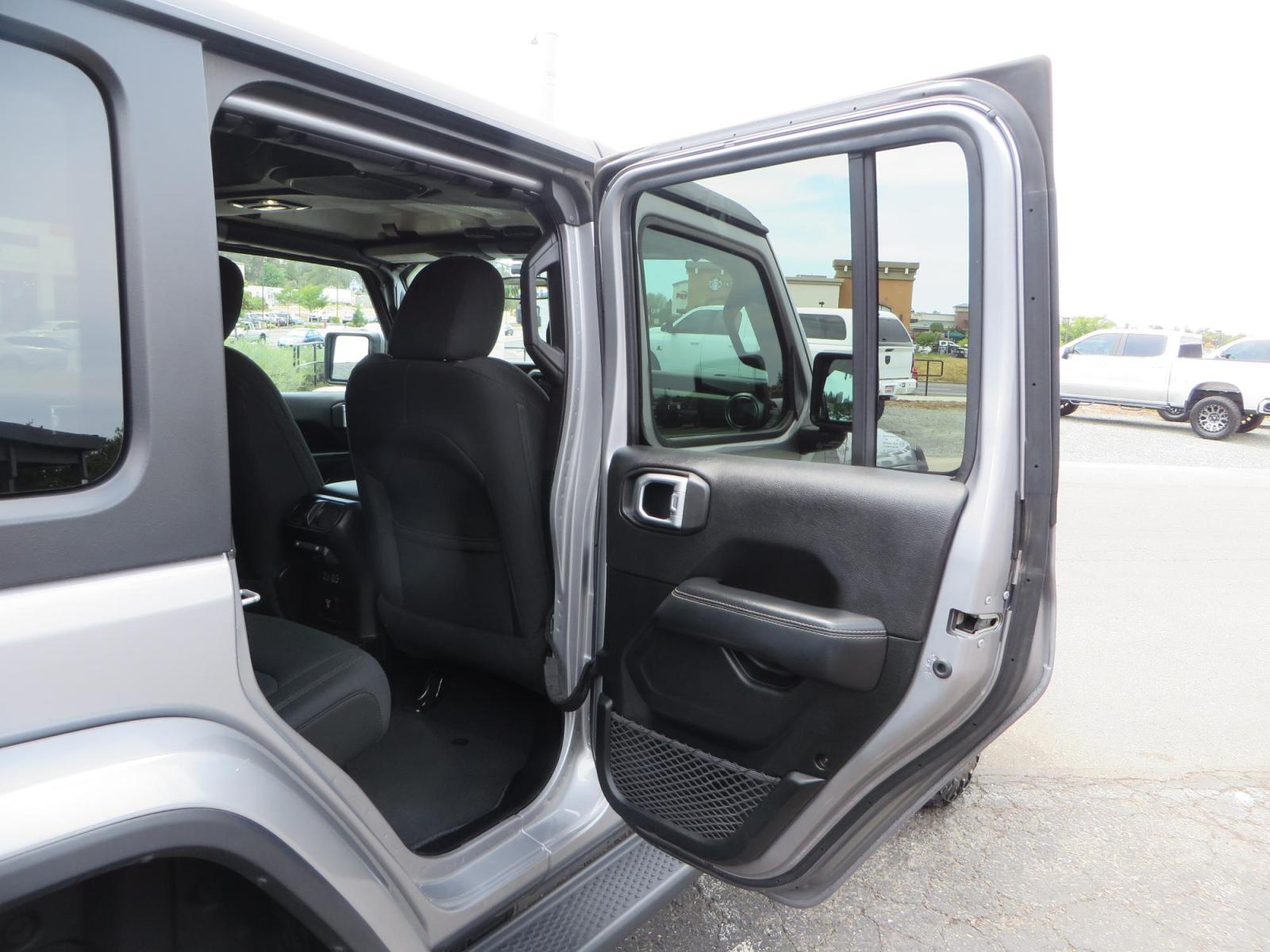 2020 Silver Jeep Wrangler Unlimited Sahara Sport Utility 4D (1C4HJXEN5LW) with an 4-Cyl eTorque Turbo 2.0 Liter engine, Automatic 8-Spd transmission, located at 2630 Grass Valley Highway, Auburn, CA, 95603, (530) 508-5100, 38.937893, -121.095482 - 3" Zone offroad lift kit, 17" KMC 544 wheels wrapped in Nitto Trail Grappler tires. - Photo #43