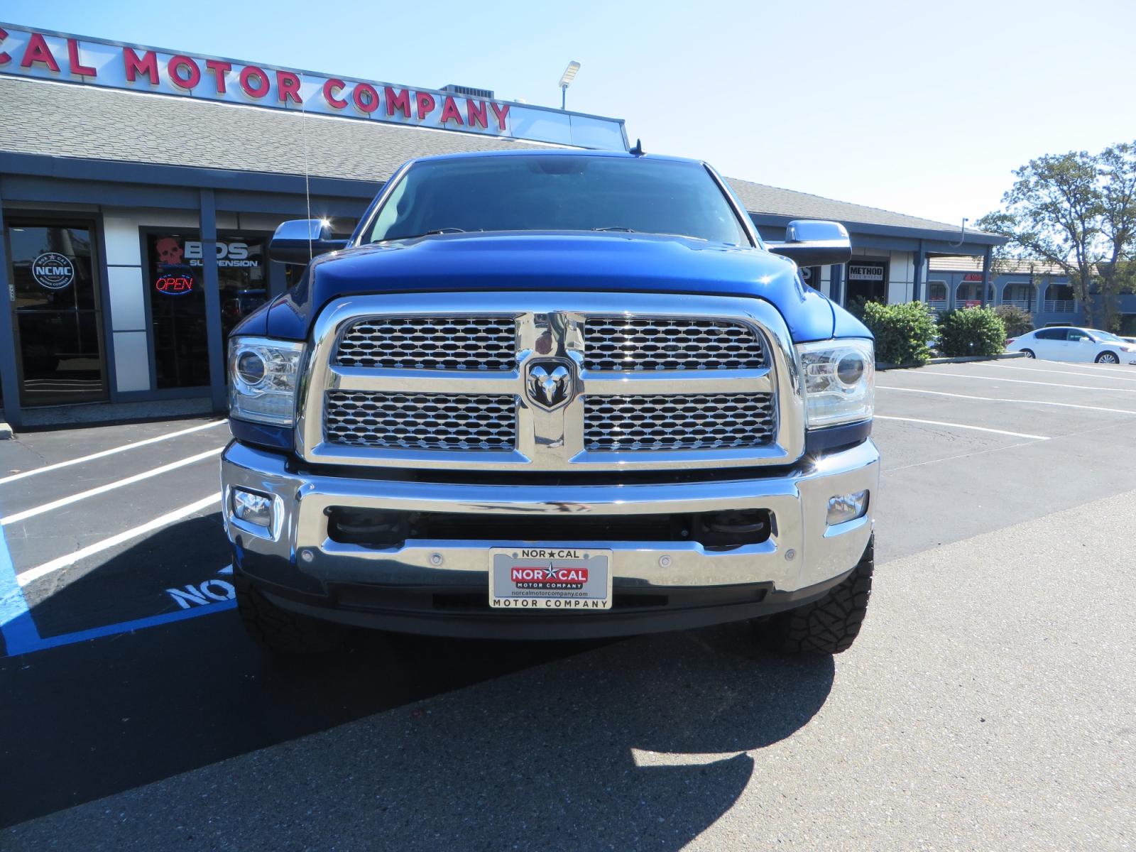 2016 Blue Ram 2500 Mega Cab Laramie Pickup 4D 6 1/3 ft (3C6UR5NL6GG) with an 6-Cyl Turbo Dsl 6.7L engine, Automatic 6-Spd transmission, located at 2630 Grass Valley Highway, Auburn, CA, 95603, (530) 508-5100, 38.937893, -121.095482 - Beautiful Ram with a new set of 18" Black Rhino Sierra wheels wrapped in Nitto Ridge Grappler tires as well as window tint. - Photo #1