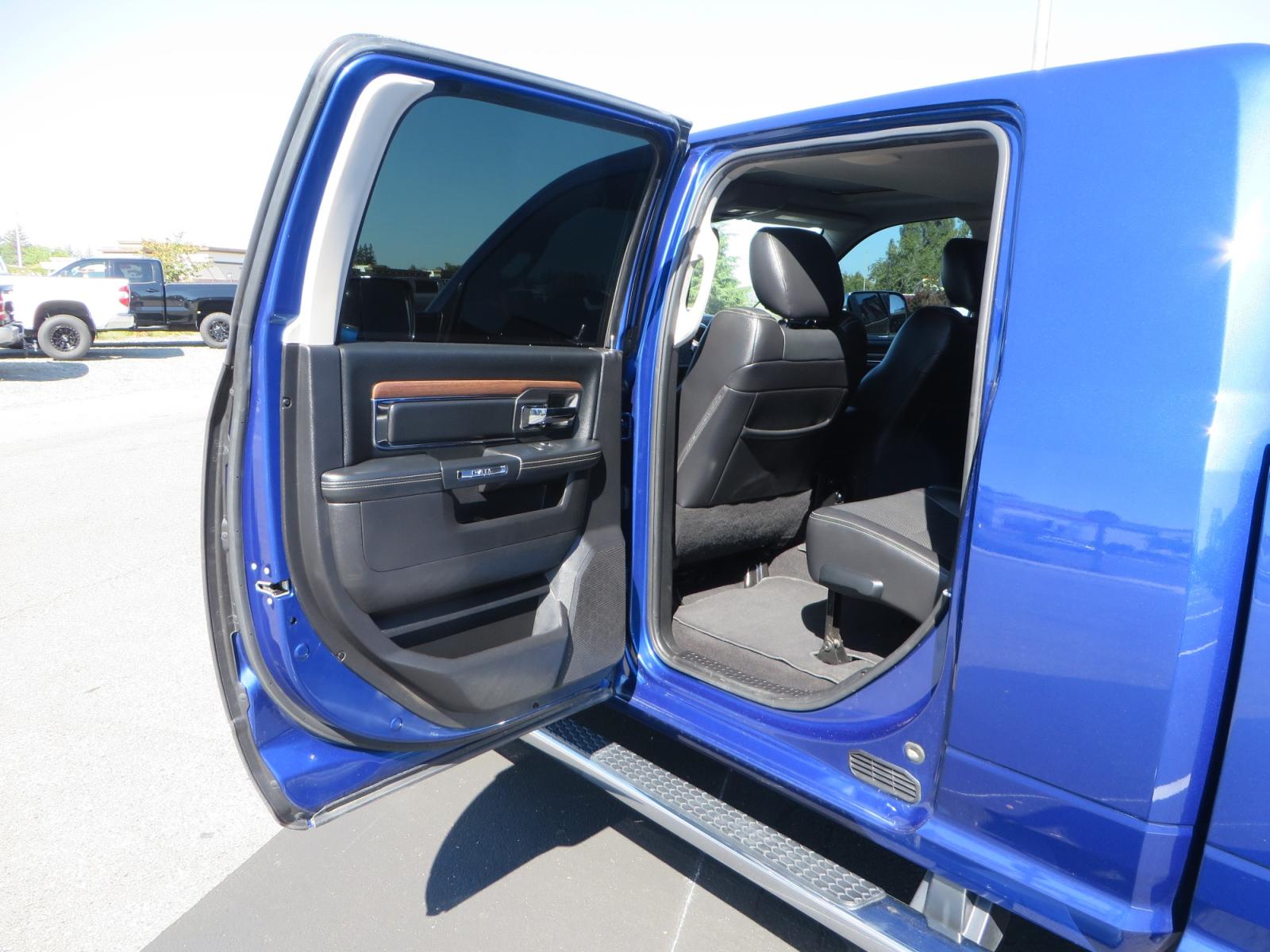 2016 Blue Ram 2500 Mega Cab Laramie Pickup 4D 6 1/3 ft (3C6UR5NL6GG) with an 6-Cyl Turbo Dsl 6.7L engine, Automatic 6-Spd transmission, located at 2630 Grass Valley Highway, Auburn, CA, 95603, (530) 508-5100, 38.937893, -121.095482 - Beautiful Ram with a new set of 18" Black Rhino Sierra wheels wrapped in Nitto Ridge Grappler tires as well as window tint. - Photo #31