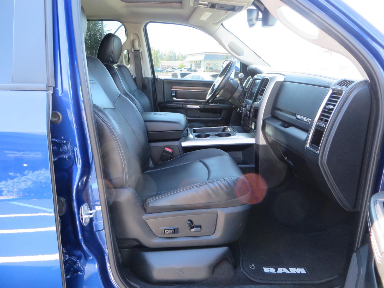2016 Blue Ram 2500 Mega Cab Laramie Pickup 4D 6 1/3 ft (3C6UR5NL6GG) with an 6-Cyl Turbo Dsl 6.7L engine, Automatic 6-Spd transmission, located at 2630 Grass Valley Highway, Auburn, CA, 95603, (530) 508-5100, 38.937893, -121.095482 - Beautiful Ram with a new set of 18" Black Rhino Sierra wheels wrapped in Nitto Ridge Grappler tires as well as window tint. - Photo #41