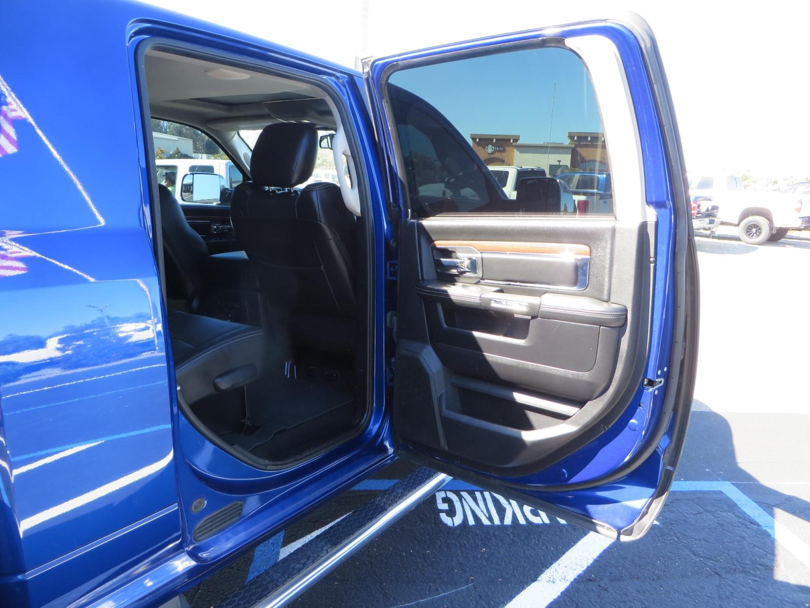 2016 Blue Ram 2500 Mega Cab Laramie Pickup 4D 6 1/3 ft (3C6UR5NL6GG) with an 6-Cyl Turbo Dsl 6.7L engine, Automatic 6-Spd transmission, located at 2630 Grass Valley Highway, Auburn, CA, 95603, (530) 508-5100, 38.937893, -121.095482 - Beautiful Ram with a new set of 18" Black Rhino Sierra wheels wrapped in Nitto Ridge Grappler tires as well as window tint. - Photo #45