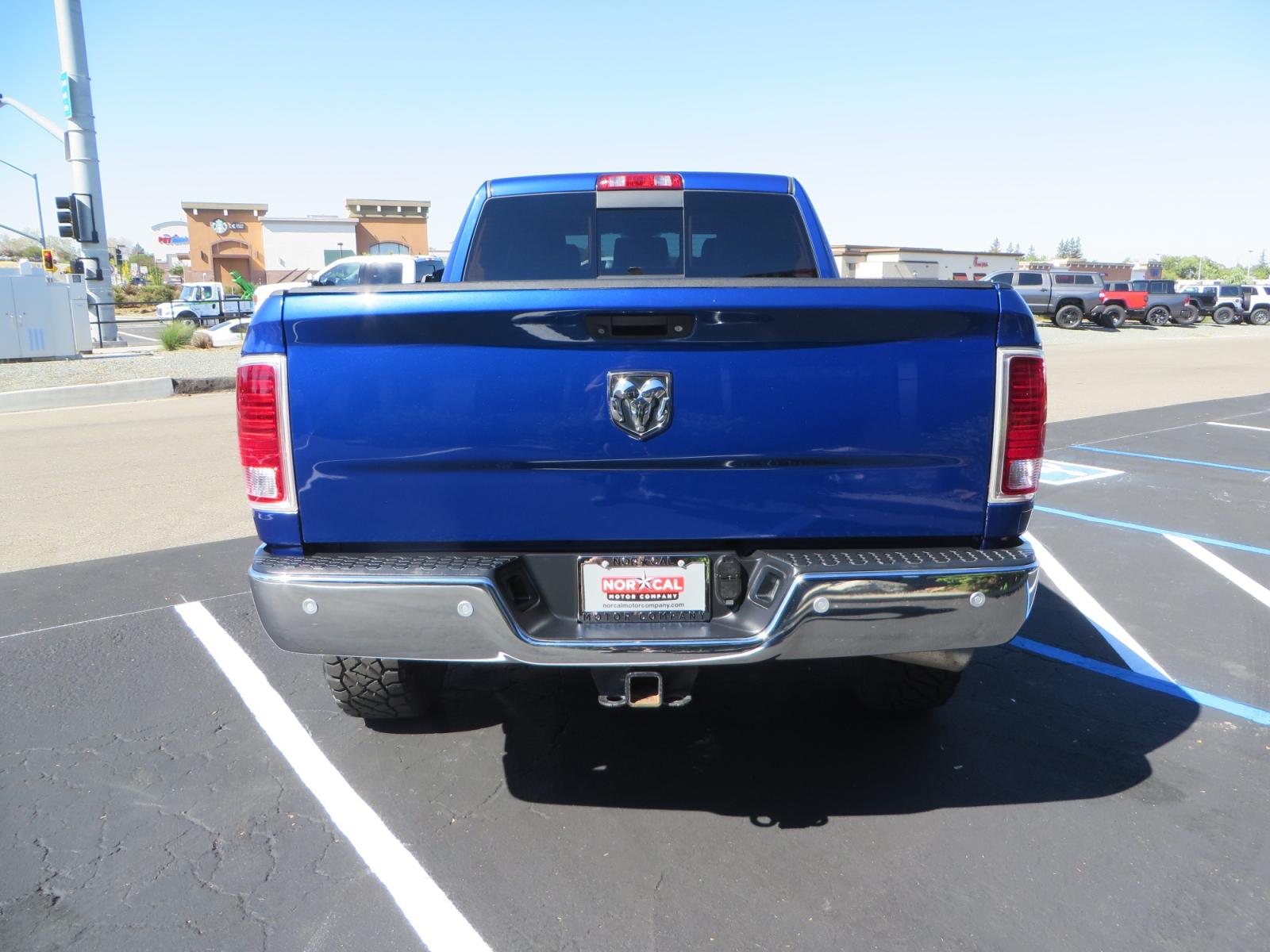 2016 Blue Ram 2500 Mega Cab Laramie Pickup 4D 6 1/3 ft (3C6UR5NL6GG) with an 6-Cyl Turbo Dsl 6.7L engine, Automatic 6-Spd transmission, located at 2630 Grass Valley Highway, Auburn, CA, 95603, (530) 508-5100, 38.937893, -121.095482 - Beautiful Ram with a new set of 18" Black Rhino Sierra wheels wrapped in Nitto Ridge Grappler tires as well as window tint. - Photo #5