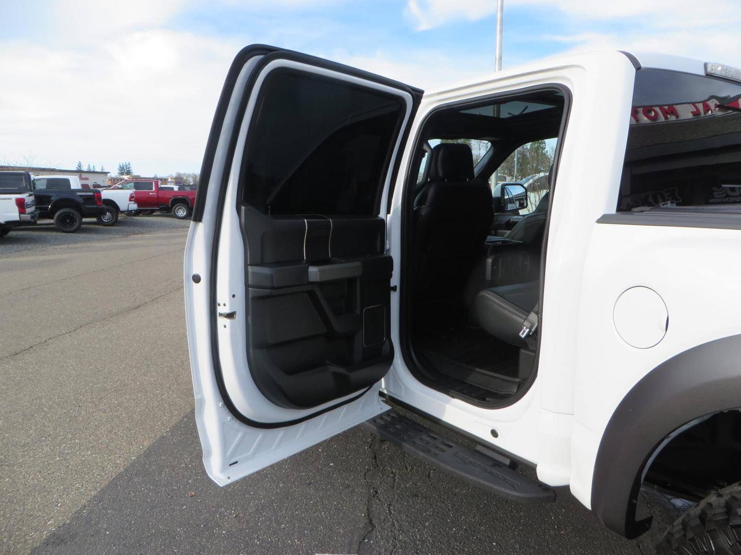 2020 White Ford F150 SuperCrew Cab Raptor Pickup 4D 5 1/2 ft (1FTFW1RG9LF) with an V6 EcoBoost High Output Twin Turbo 3.5 Liter engine, Automatic 10-Spd w/Sport Mode transmission, located at 2630 Grass Valley Highway, Auburn, CA, 95603, (530) 508-5100, 38.937893, -121.095482 - Features 17'' Fuel Rebel wheels, 37'' Goodyear Wrangler Boulder MT tires, Bakflip Tonneau cover, Lightbar behind the grille, Fog pocket led's, Cobb exhaust and cold air intake. - Photo#46
