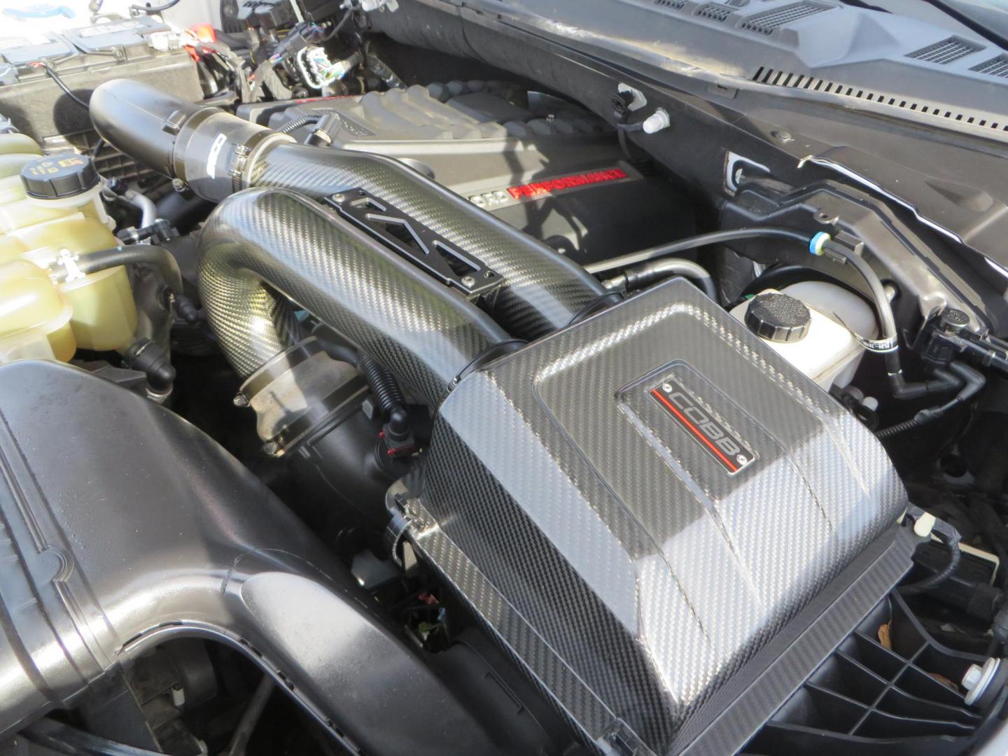 2020 White Ford F150 SuperCrew Cab Raptor Pickup 4D 5 1/2 ft (1FTFW1RG9LF) with an V6 EcoBoost High Output Twin Turbo 3.5 Liter engine, Automatic 10-Spd w/Sport Mode transmission, located at 2630 Grass Valley Highway, Auburn, CA, 95603, (530) 508-5100, 38.937893, -121.095482 - Features 17'' Fuel Rebel wheels, 37'' Goodyear Wrangler Boulder MT tires, Bakflip Tonneau cover, Lightbar behind the grille, Fog pocket led's, Cobb exhaust and cold air intake. - Photo#70