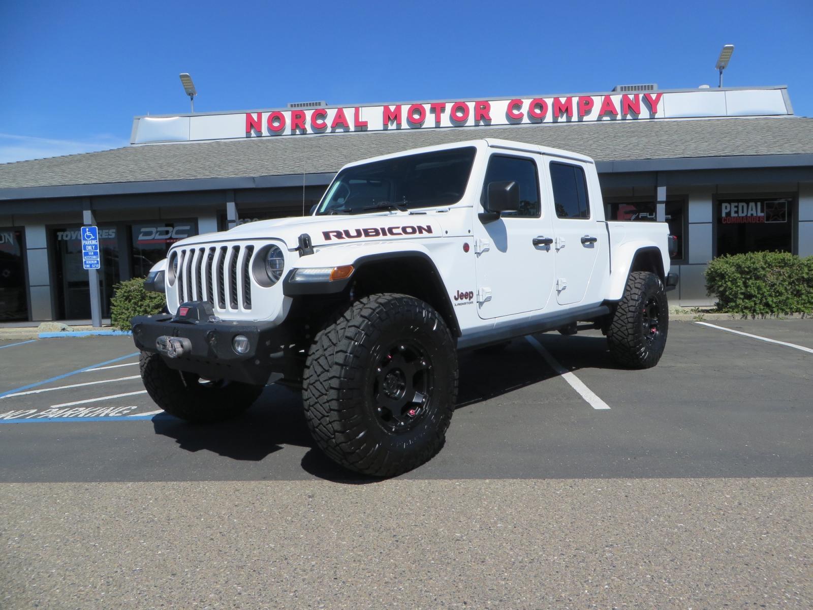 2020 White /BLACK Jeep Gladiator Rubicon (1C6JJTBG3LL) with an 3.6L V6 DOHC 24V engine, 6M transmission, located at 2630 Grass Valley Highway, Auburn, CA, 95603, (530) 508-5100, 38.937893, -121.095482 - Clean Gladiator Rubicon Featuring 17" Teraflex Nomad wheels with quick dump air valves, 37" Nitto Ridge Grappler tires, Next Venture front bumper, Warn 10-S winch, Factor 55 winch fairlead and Ultra hook. - Photo #0