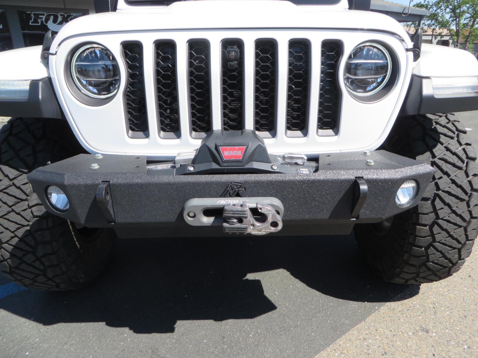 2020 White /BLACK Jeep Gladiator Rubicon (1C6JJTBG3LL) with an 3.6L V6 DOHC 24V engine, 6M transmission, located at 2630 Grass Valley Highway, Auburn, CA, 95603, (530) 508-5100, 38.937893, -121.095482 - Clean Gladiator Rubicon Featuring 17" Teraflex Nomad wheels with quick dump air valves, 37" Nitto Ridge Grappler tires, Next Venture front bumper, Warn 10-S winch, Factor 55 winch fairlead and Ultra hook. - Photo #11