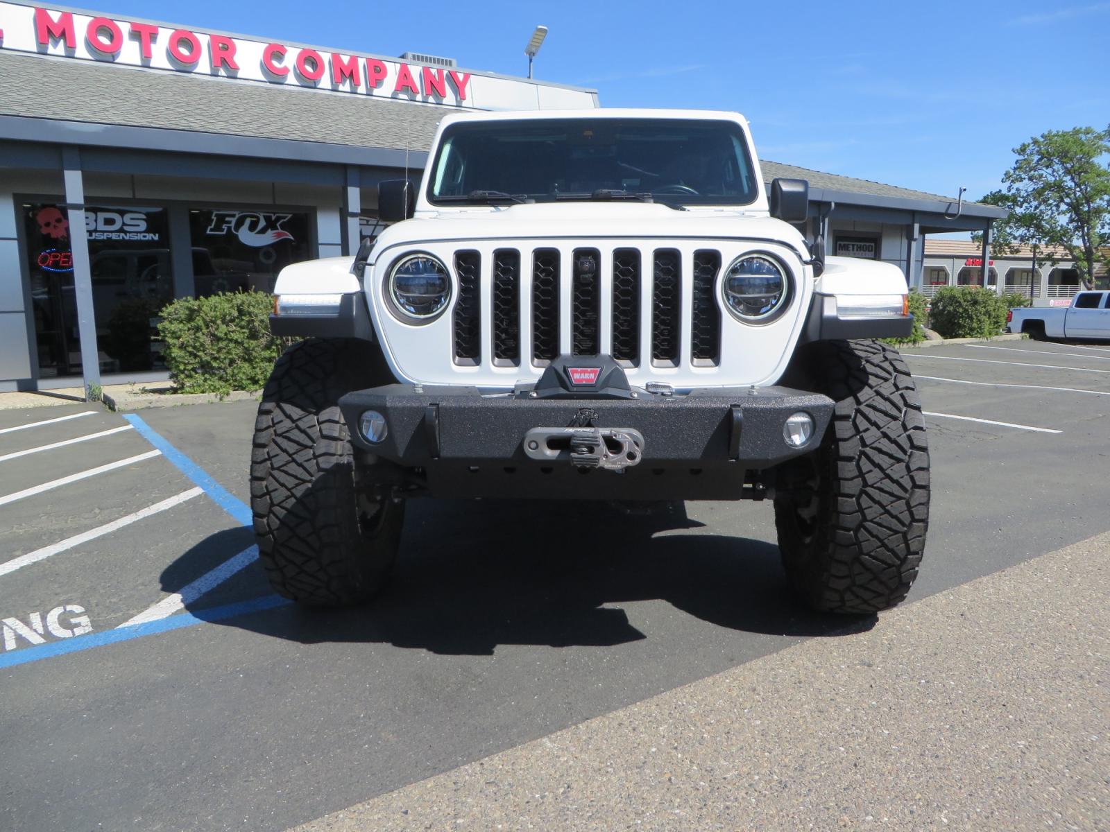 2020 White /BLACK Jeep Gladiator Rubicon (1C6JJTBG3LL) with an 3.6L V6 DOHC 24V engine, 6M transmission, located at 2630 Grass Valley Highway, Auburn, CA, 95603, (530) 508-5100, 38.937893, -121.095482 - Clean Gladiator Rubicon Featuring 17" Teraflex Nomad wheels with quick dump air valves, 37" Nitto Ridge Grappler tires, Next Venture front bumper, Warn 10-S winch, Factor 55 winch fairlead and Ultra hook. - Photo #1