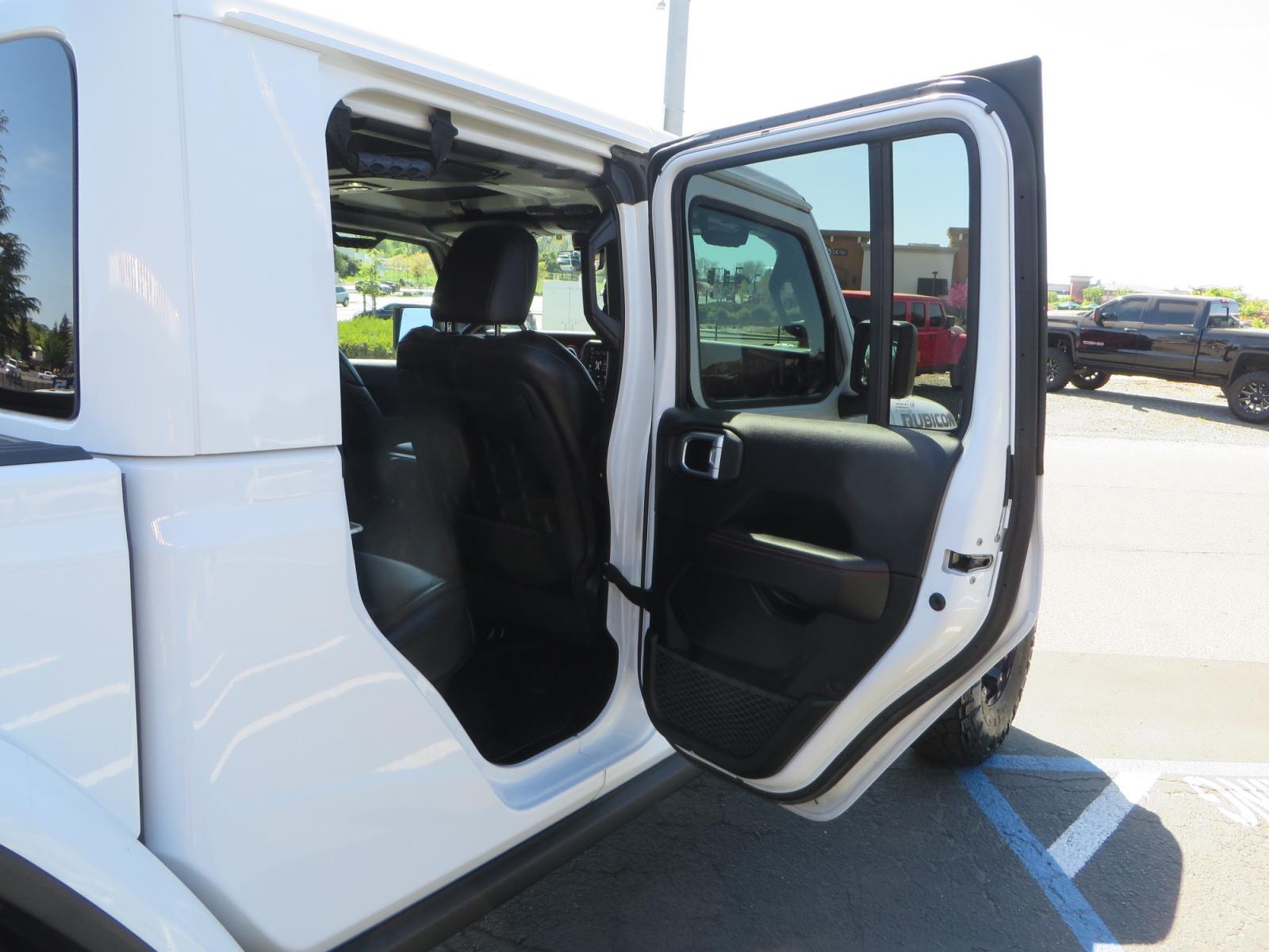 2020 White /BLACK Jeep Gladiator Rubicon (1C6JJTBG3LL) with an 3.6L V6 DOHC 24V engine, 6M transmission, located at 2630 Grass Valley Highway, Auburn, CA, 95603, (530) 508-5100, 38.937893, -121.095482 - Clean Gladiator Rubicon Featuring 17" Teraflex Nomad wheels with quick dump air valves, 37" Nitto Ridge Grappler tires, Next Venture front bumper, Warn 10-S winch, Factor 55 winch fairlead and Ultra hook. - Photo #53