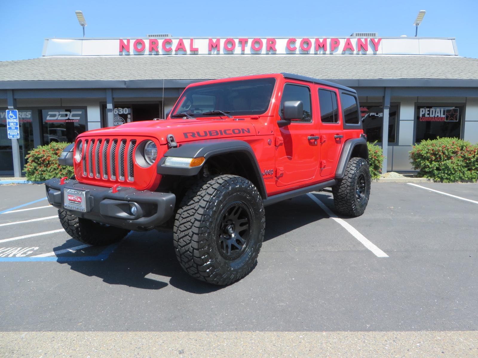 2020 Red /TAN Jeep Wrangler Unlimited Rubicon (1C4HJXFN8LW) with an 2.0L L4 DOHC 16V TURBO engine, 6A transmission, located at 2630 Grass Valley Highway, Auburn, CA, 95603, (530) 508-5100, 38.937893, -121.095482 - Featuring a brand new set of 17" Fuel Recoil wheels and 35" Toyo RT trail tires. - Photo #0