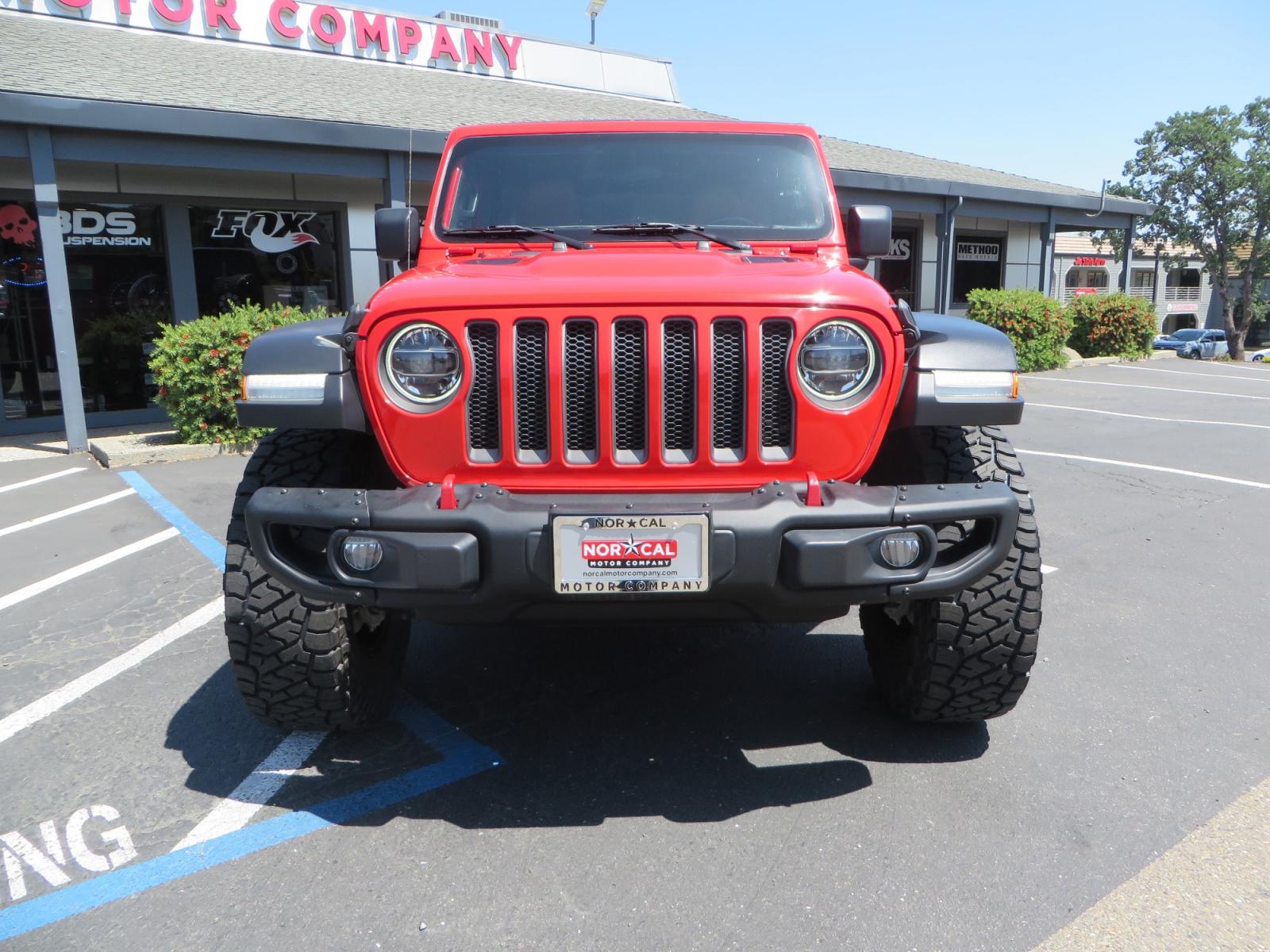 2020 Red /TAN Jeep Wrangler Unlimited Rubicon (1C4HJXFN8LW) with an 2.0L L4 DOHC 16V TURBO engine, 6A transmission, located at 2630 Grass Valley Highway, Auburn, CA, 95603, (530) 508-5100, 38.937893, -121.095482 - Featuring a brand new set of 17" Fuel Recoil wheels and 35" Toyo RT trail tires. - Photo #1