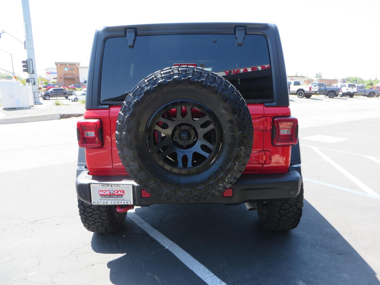 2020 Red /TAN Jeep Wrangler Unlimited Rubicon (1C4HJXFN8LW) with an 2.0L L4 DOHC 16V TURBO engine, 6A transmission, located at 2630 Grass Valley Highway, Auburn, CA, 95603, (530) 508-5100, 38.937893, -121.095482 - Featuring a brand new set of 17" Fuel Recoil wheels and 35" Toyo RT trail tires. - Photo #5