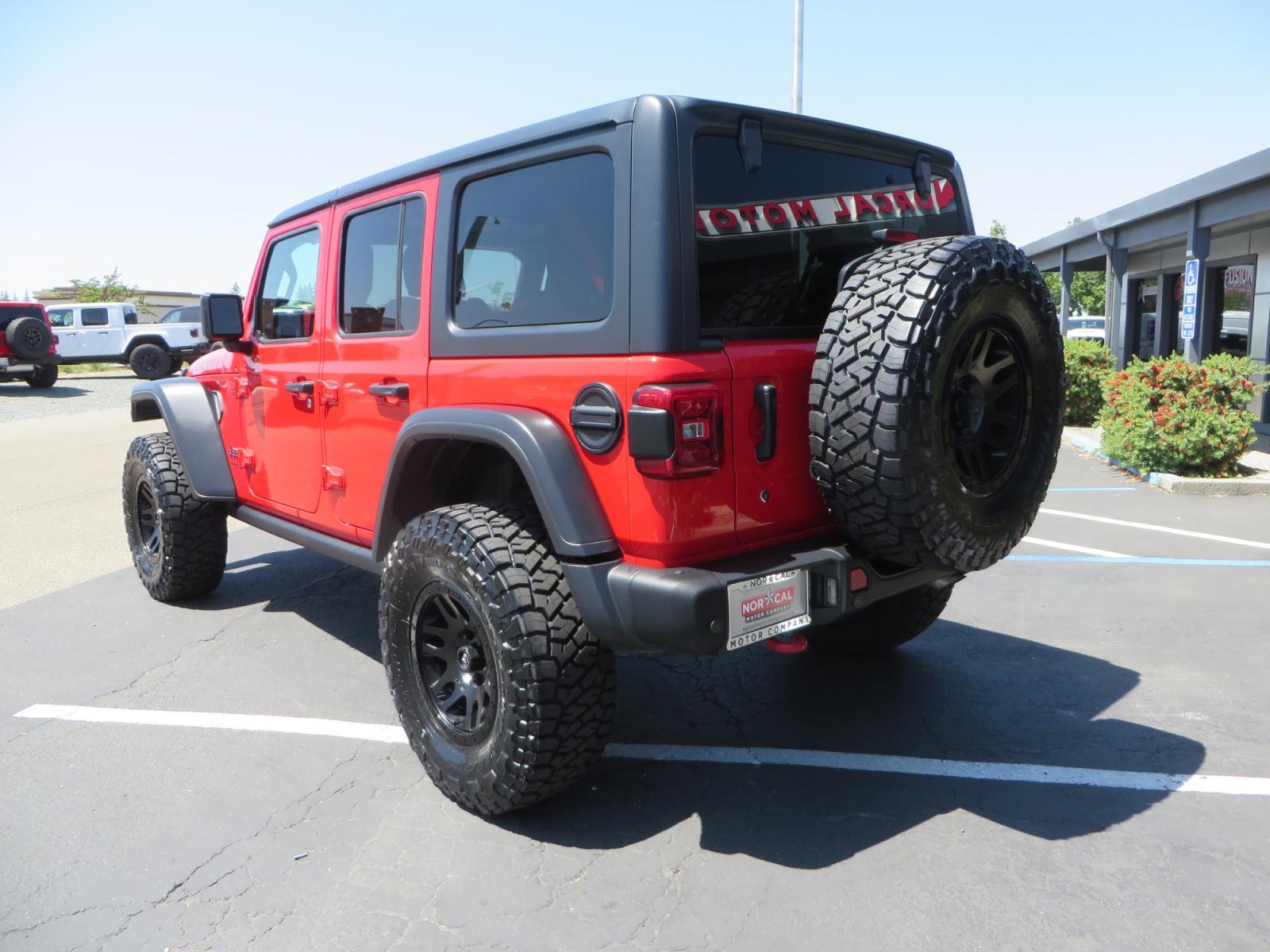 2020 Red /TAN Jeep Wrangler Unlimited Rubicon (1C4HJXFN8LW) with an 2.0L L4 DOHC 16V TURBO engine, 6A transmission, located at 2630 Grass Valley Highway, Auburn, CA, 95603, (530) 508-5100, 38.937893, -121.095482 - Photo #6