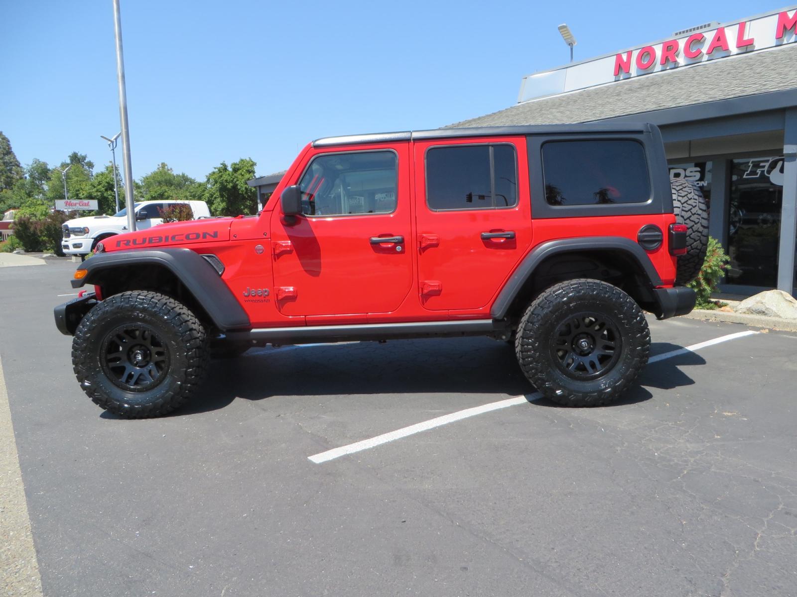 2020 Red /TAN Jeep Wrangler Unlimited Rubicon (1C4HJXFN8LW) with an 2.0L L4 DOHC 16V TURBO engine, 6A transmission, located at 2630 Grass Valley Highway, Auburn, CA, 95603, (530) 508-5100, 38.937893, -121.095482 - Photo #7
