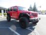 2020 Red /BLACK Jeep Wrangler Unlimited Rubicon (1C4HJXFN8LW) with an 2.0L L4 DOHC 16V TURBO engine, 6A transmission, located at 2630 Grass Valley Highway, Auburn, CA, 95603, (530) 508-5100, 38.937893, -121.095482 - Features - 17'' Fuel Recoil wheels, 35'' Nitto Ridge Grappler tires, Smittybilt XRC Flat fenders, Smittybilt inner fender liners, and new Alea Leather. - Photo#6