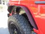 2020 Red /BLACK Jeep Wrangler Unlimited Rubicon (1C4HJXFN8LW) with an 2.0L L4 DOHC 16V TURBO engine, 6A transmission, located at 2630 Grass Valley Highway, Auburn, CA, 95603, (530) 508-5100, 38.937893, -121.095482 - Features - 17'' Fuel Recoil wheels, 35'' Nitto Ridge Grappler tires, Smittybilt XRC Flat fenders, Smittybilt inner fender liners, and new Alea Leather. - Photo#12