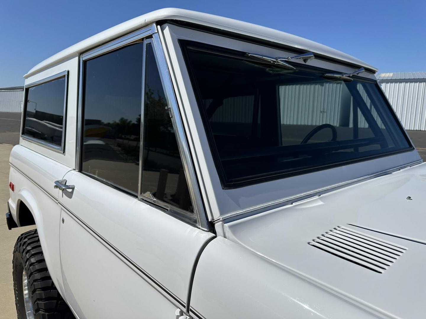 1971 White /Black / Grey Ford Bronco (U15GLK86693) with an 302 engine, np 435 4 speed transmission, located at 2630 Grass Valley Highway, Auburn, CA, 95603, (530) 508-5100, 38.937893, -121.095482 - 1971 FORD BRONCO BUILD CALIFORNIA BRONCO HARD TOP AND NO RUST REBUILT 302 WITH PERFORMANCE CAM, EDELBROCK MANIFOLD, HOLLEY AVENGER 650 CARB & MSD IGNITION NP 435 4 SPEED WITH WILD HORSE BILLET SHIFT EXTENDER DANA 20 WITH WILD HORSE TWIN STICK TRANSFER CASE NEW PAINLESS WIRING HARNESS RHINO LIN - Photo#33