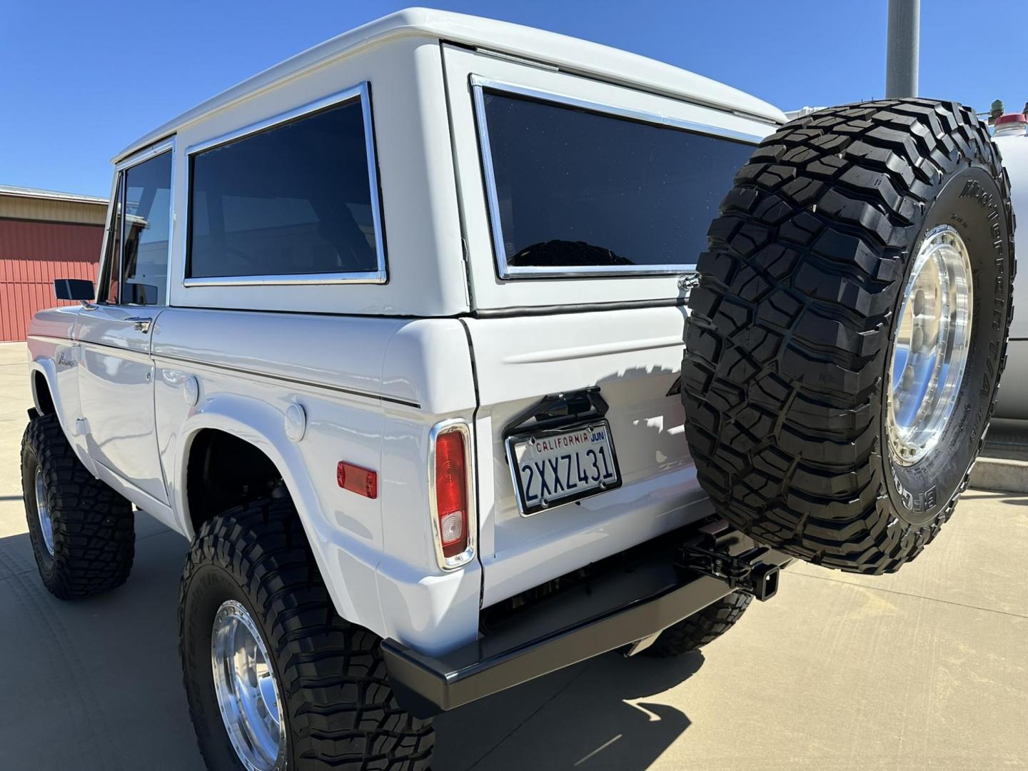 1971 White /Black / Grey Ford Bronco (U15GLK86693) with an 302 engine, np 435 4 speed transmission, located at 2630 Grass Valley Highway, Auburn, CA, 95603, (530) 508-5100, 38.937893, -121.095482 - 1971 FORD BRONCO BUILD CALIFORNIA BRONCO HARD TOP AND NO RUST REBUILT 302 WITH PERFORMANCE CAM, EDELBROCK MANIFOLD, HOLLEY AVENGER 650 CARB & MSD IGNITION NP 435 4 SPEED WITH WILD HORSE BILLET SHIFT EXTENDER DANA 20 WITH WILD HORSE TWIN STICK TRANSFER CASE NEW PAINLESS WIRING HARNESS RHINO LIN - Photo#38