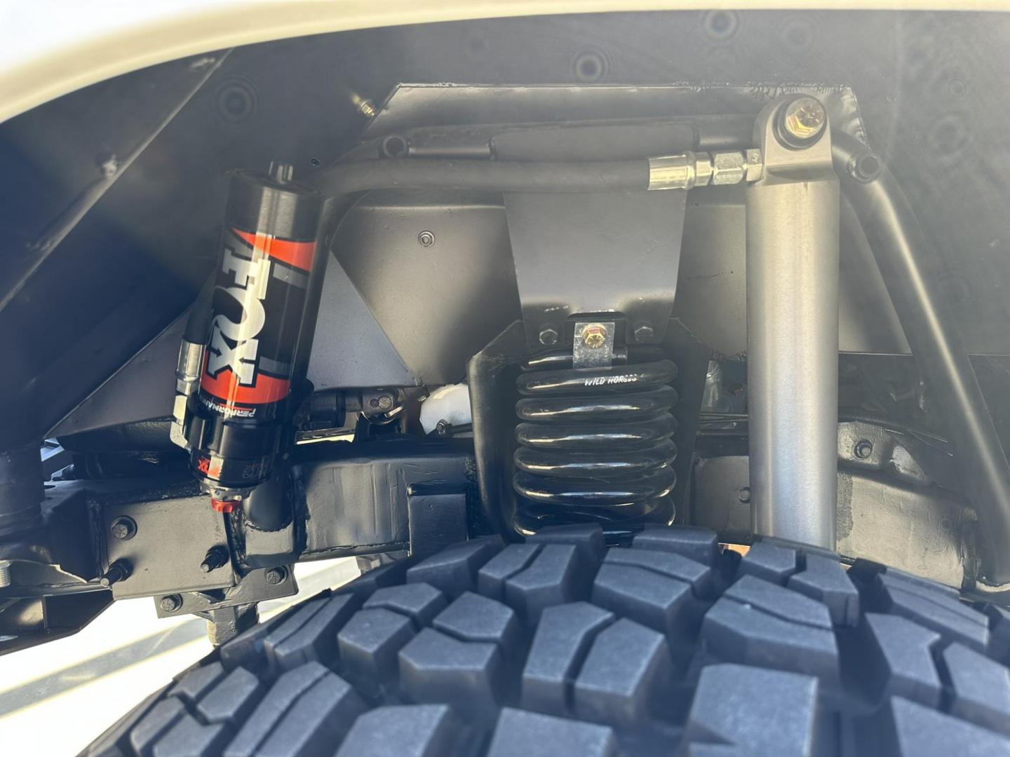 1971 White /Black / Grey Ford Bronco (U15GLK86693) with an 302 engine, np 435 4 speed transmission, located at 2630 Grass Valley Highway, Auburn, CA, 95603, (530) 508-5100, 38.937893, -121.095482 - 1971 FORD BRONCO BUILD CALIFORNIA BRONCO HARD TOP AND NO RUST REBUILT 302 WITH PERFORMANCE CAM, EDELBROCK MANIFOLD, HOLLEY AVENGER 650 CARB & MSD IGNITION NP 435 4 SPEED WITH WILD HORSE BILLET SHIFT EXTENDER DANA 20 WITH WILD HORSE TWIN STICK TRANSFER CASE NEW PAINLESS WIRING HARNESS RHINO LIN - Photo#60