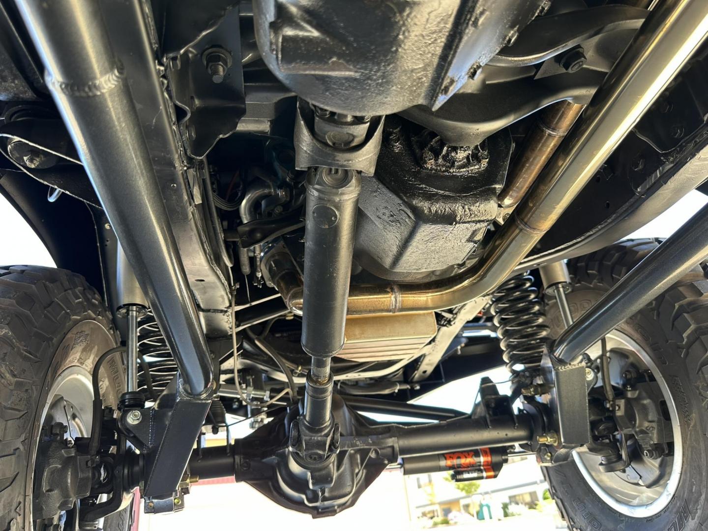1971 White /Black / Grey Ford Bronco (U15GLK86693) with an 302 engine, np 435 4 speed transmission, located at 2630 Grass Valley Highway, Auburn, CA, 95603, (530) 508-5100, 38.937893, -121.095482 - 1971 FORD BRONCO BUILD CALIFORNIA BRONCO HARD TOP AND NO RUST REBUILT 302 WITH PERFORMANCE CAM, EDELBROCK MANIFOLD, HOLLEY AVENGER 650 CARB & MSD IGNITION NP 435 4 SPEED WITH WILD HORSE BILLET SHIFT EXTENDER DANA 20 WITH WILD HORSE TWIN STICK TRANSFER CASE NEW PAINLESS WIRING HARNESS RHINO LIN - Photo#62