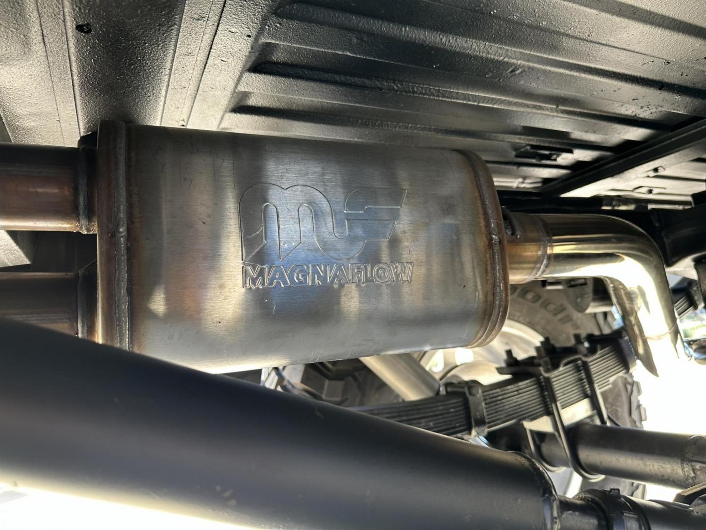 1971 White /Black / Grey Ford Bronco (U15GLK86693) with an 302 engine, np 435 4 speed transmission, located at 2630 Grass Valley Highway, Auburn, CA, 95603, (530) 508-5100, 38.937893, -121.095482 - 1971 FORD BRONCO BUILD CALIFORNIA BRONCO HARD TOP AND NO RUST REBUILT 302 WITH PERFORMANCE CAM, EDELBROCK MANIFOLD, HOLLEY AVENGER 650 CARB & MSD IGNITION NP 435 4 SPEED WITH WILD HORSE BILLET SHIFT EXTENDER DANA 20 WITH WILD HORSE TWIN STICK TRANSFER CASE NEW PAINLESS WIRING HARNESS RHINO LIN - Photo#65