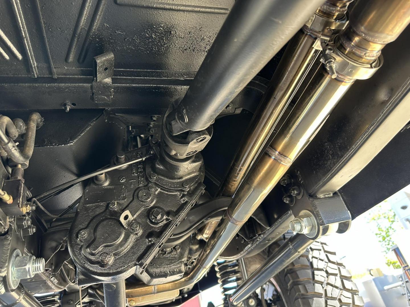 1971 White /Black / Grey Ford Bronco (U15GLK86693) with an 302 engine, np 435 4 speed transmission, located at 2630 Grass Valley Highway, Auburn, CA, 95603, (530) 508-5100, 38.937893, -121.095482 - 1971 FORD BRONCO BUILD CALIFORNIA BRONCO HARD TOP AND NO RUST REBUILT 302 WITH PERFORMANCE CAM, EDELBROCK MANIFOLD, HOLLEY AVENGER 650 CARB & MSD IGNITION NP 435 4 SPEED WITH WILD HORSE BILLET SHIFT EXTENDER DANA 20 WITH WILD HORSE TWIN STICK TRANSFER CASE NEW PAINLESS WIRING HARNESS RHINO LIN - Photo#66