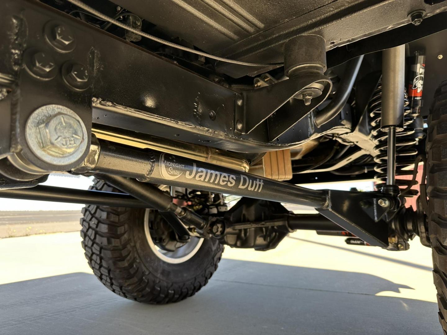 1971 White /Black / Grey Ford Bronco (U15GLK86693) with an 302 engine, np 435 4 speed transmission, located at 2630 Grass Valley Highway, Auburn, CA, 95603, (530) 508-5100, 38.937893, -121.095482 - 1971 FORD BRONCO BUILD CALIFORNIA BRONCO HARD TOP AND NO RUST REBUILT 302 WITH PERFORMANCE CAM, EDELBROCK MANIFOLD, HOLLEY AVENGER 650 CARB & MSD IGNITION NP 435 4 SPEED WITH WILD HORSE BILLET SHIFT EXTENDER DANA 20 WITH WILD HORSE TWIN STICK TRANSFER CASE NEW PAINLESS WIRING HARNESS RHINO LIN - Photo#78