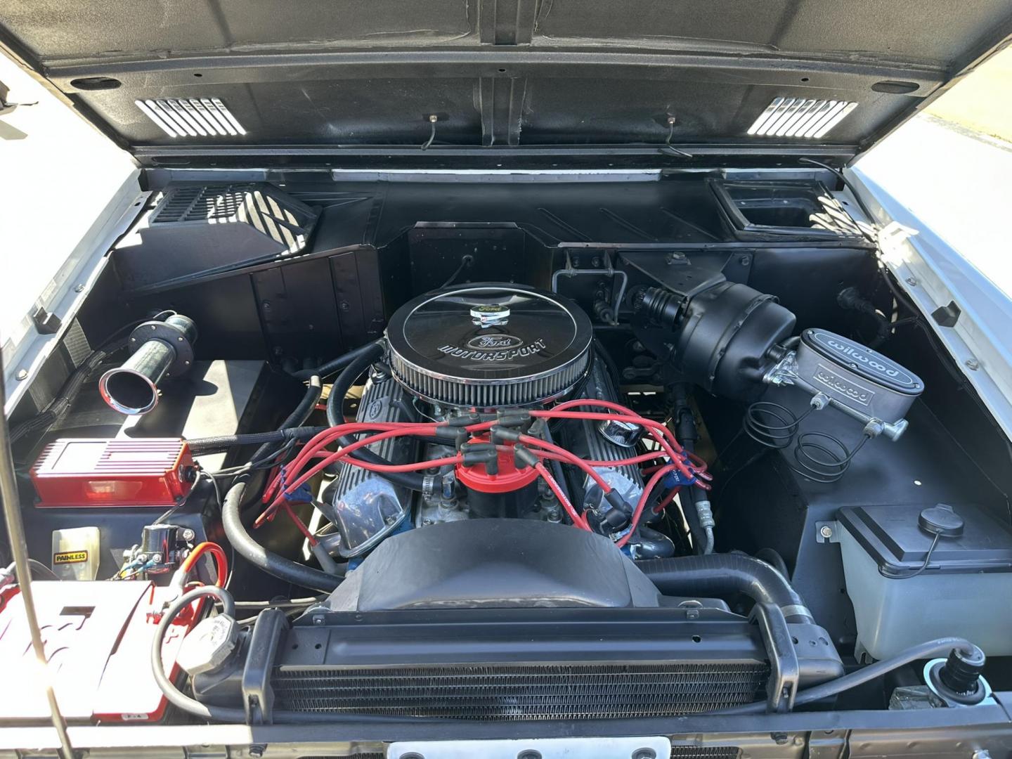 1971 White /Black / Grey Ford Bronco (U15GLK86693) with an 302 engine, np 435 4 speed transmission, located at 2630 Grass Valley Highway, Auburn, CA, 95603, (530) 508-5100, 38.937893, -121.095482 - 1971 FORD BRONCO BUILD CALIFORNIA BRONCO HARD TOP AND NO RUST REBUILT 302 WITH PERFORMANCE CAM, EDELBROCK MANIFOLD, HOLLEY AVENGER 650 CARB & MSD IGNITION NP 435 4 SPEED WITH WILD HORSE BILLET SHIFT EXTENDER DANA 20 WITH WILD HORSE TWIN STICK TRANSFER CASE NEW PAINLESS WIRING HARNESS RHINO LIN - Photo#80